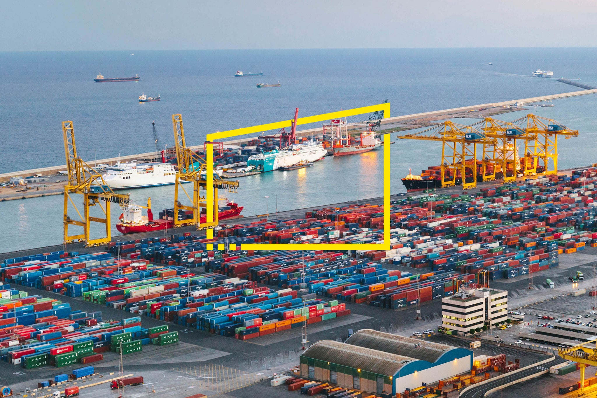 Commercial dock with containers and cranes static