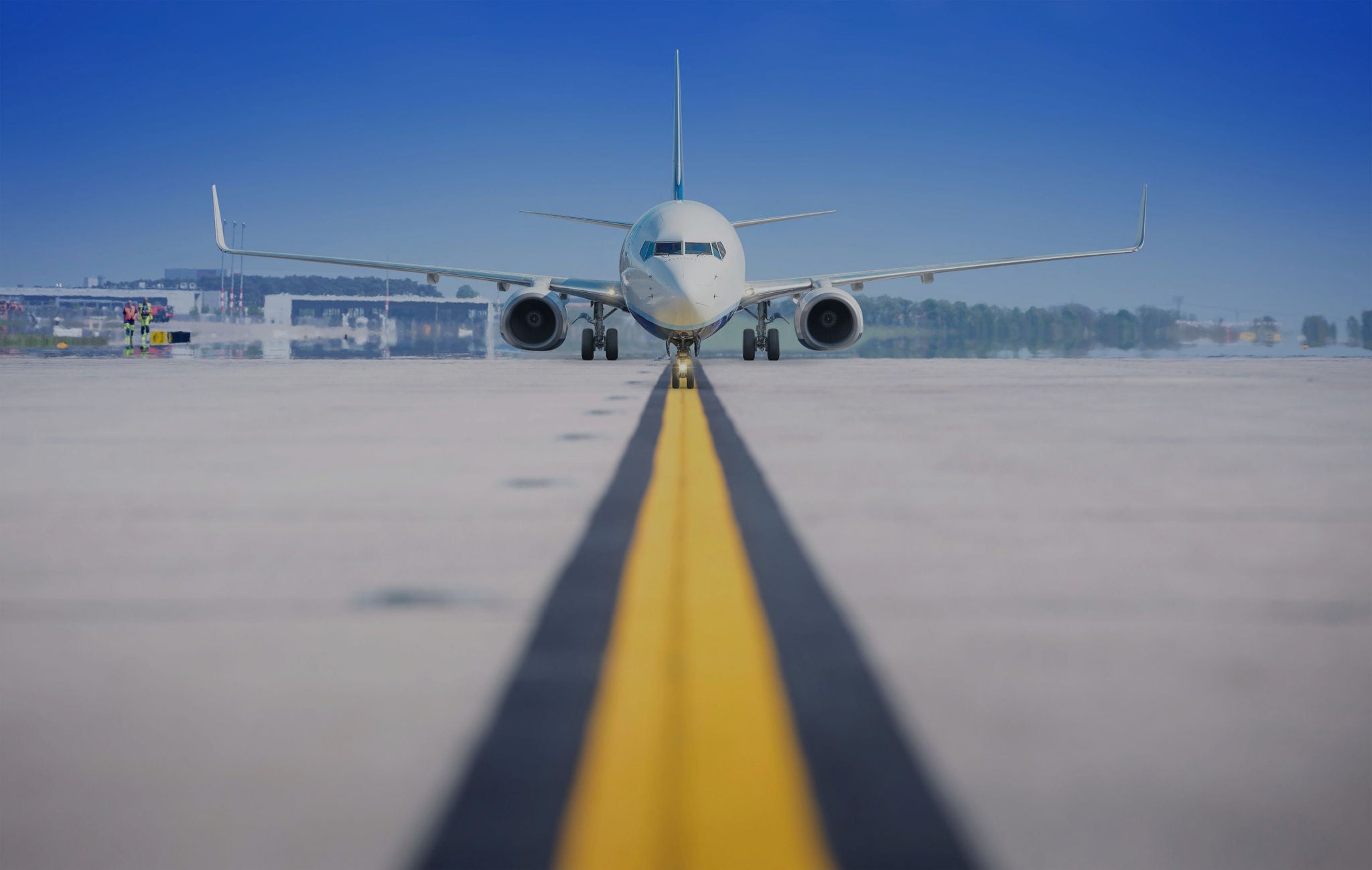 Modern airliner on a runway.