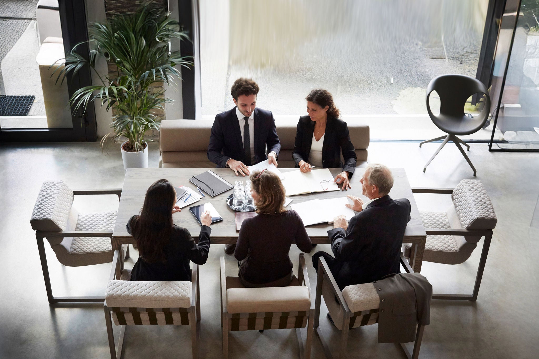 High angle view of financial advisor discussion