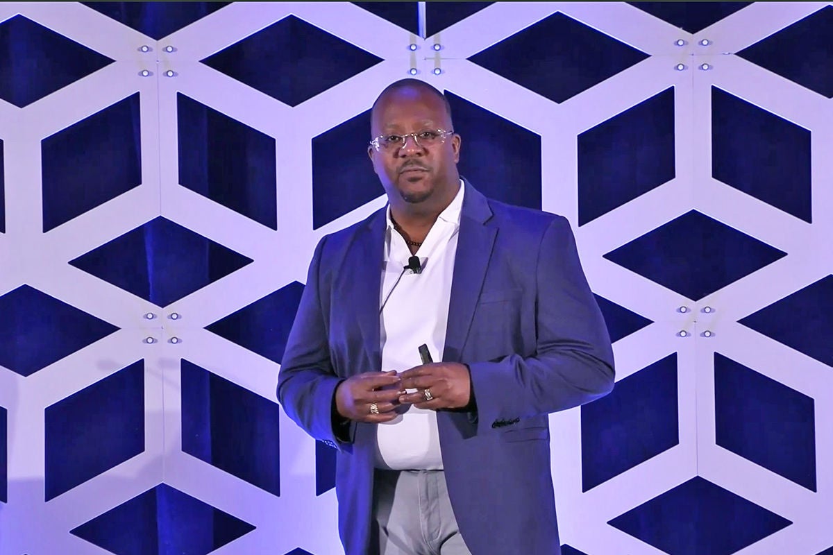 Sheldon Clark speaks at a pega event