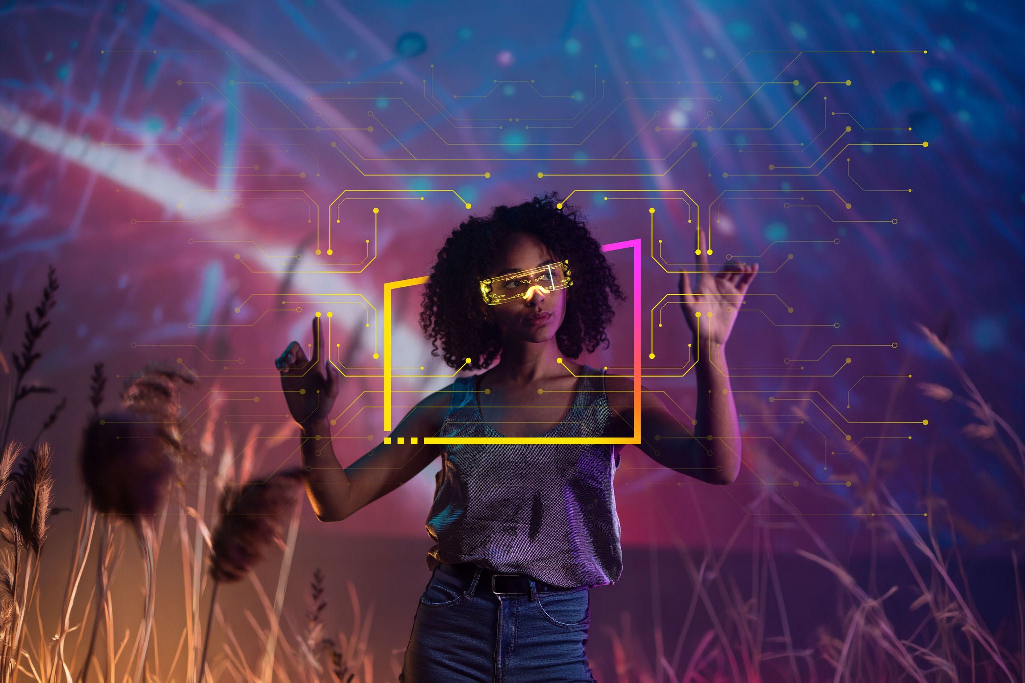 Woman with virtual reality VR goggles playing augmented reality game