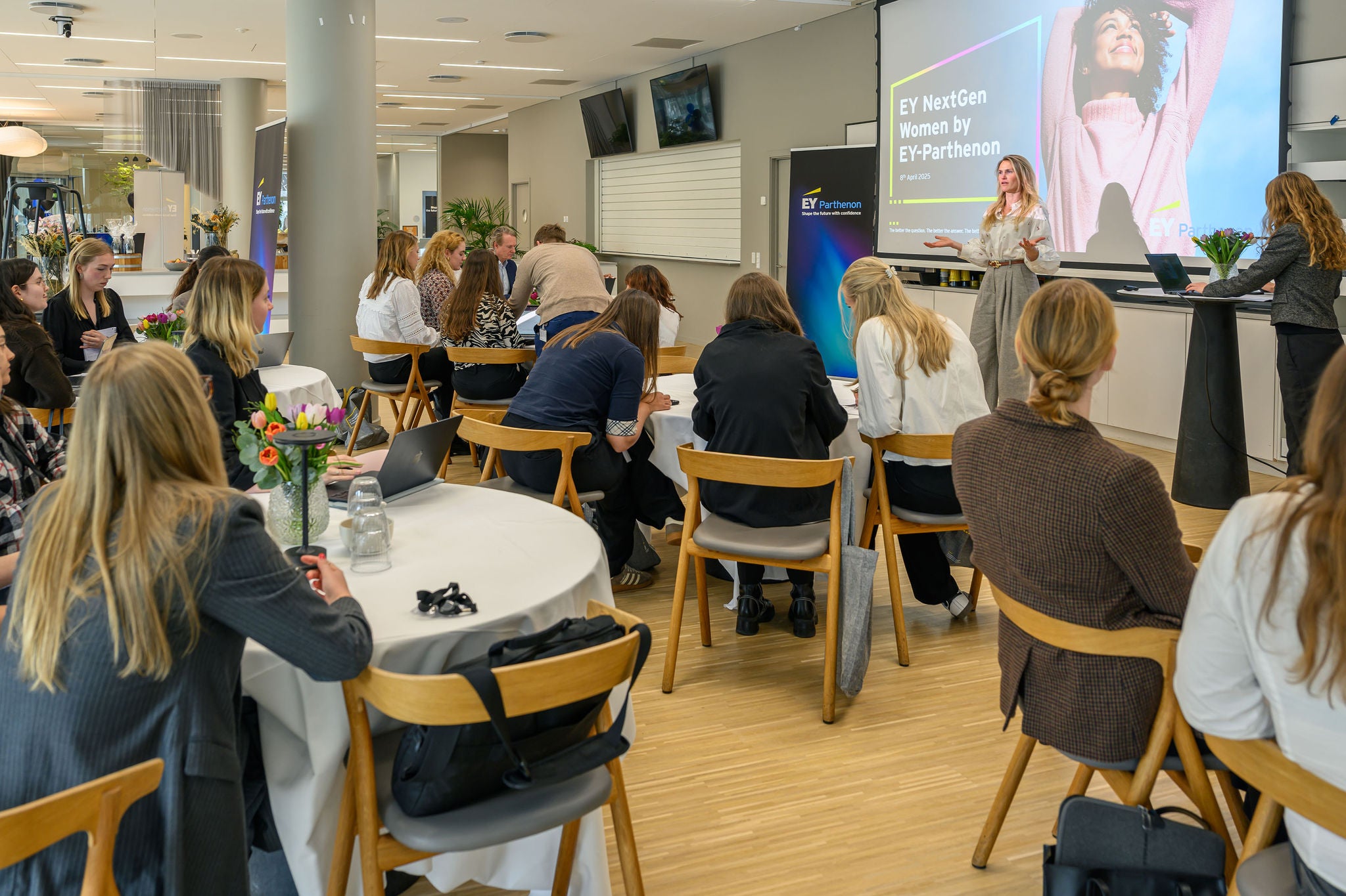 Woman presenting at NextGen event