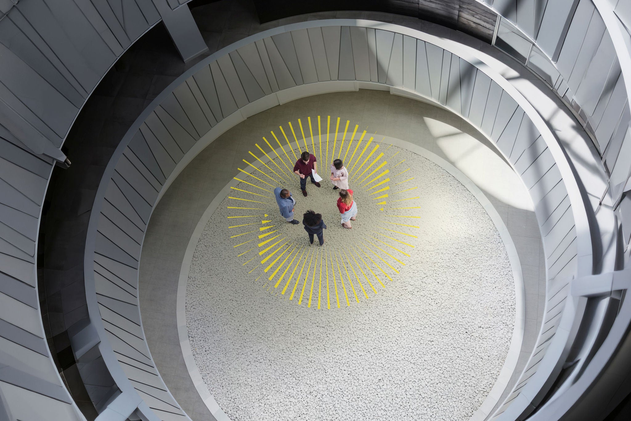 Overhead view of collaborative team in circle