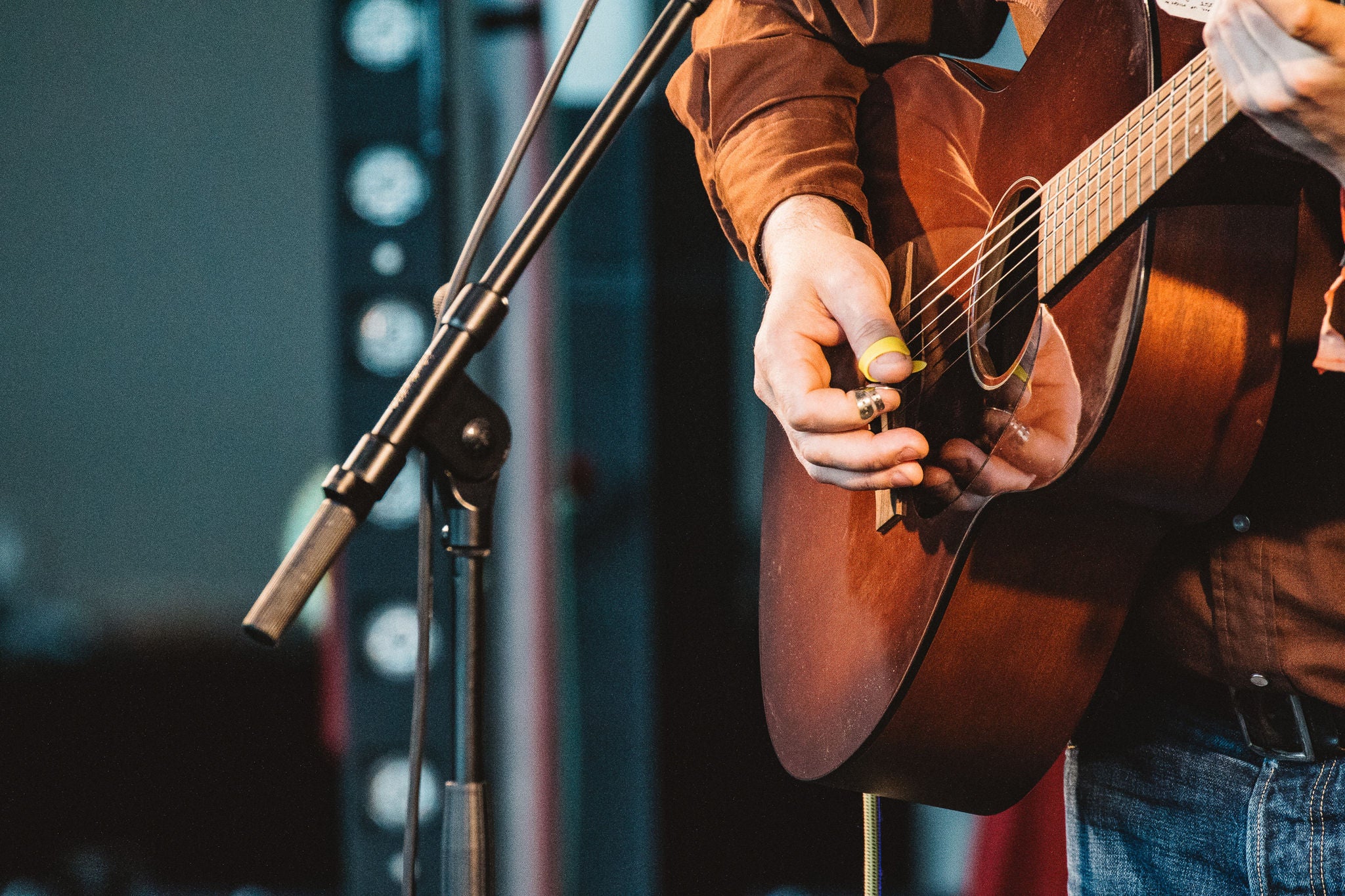 Person playing a guitar