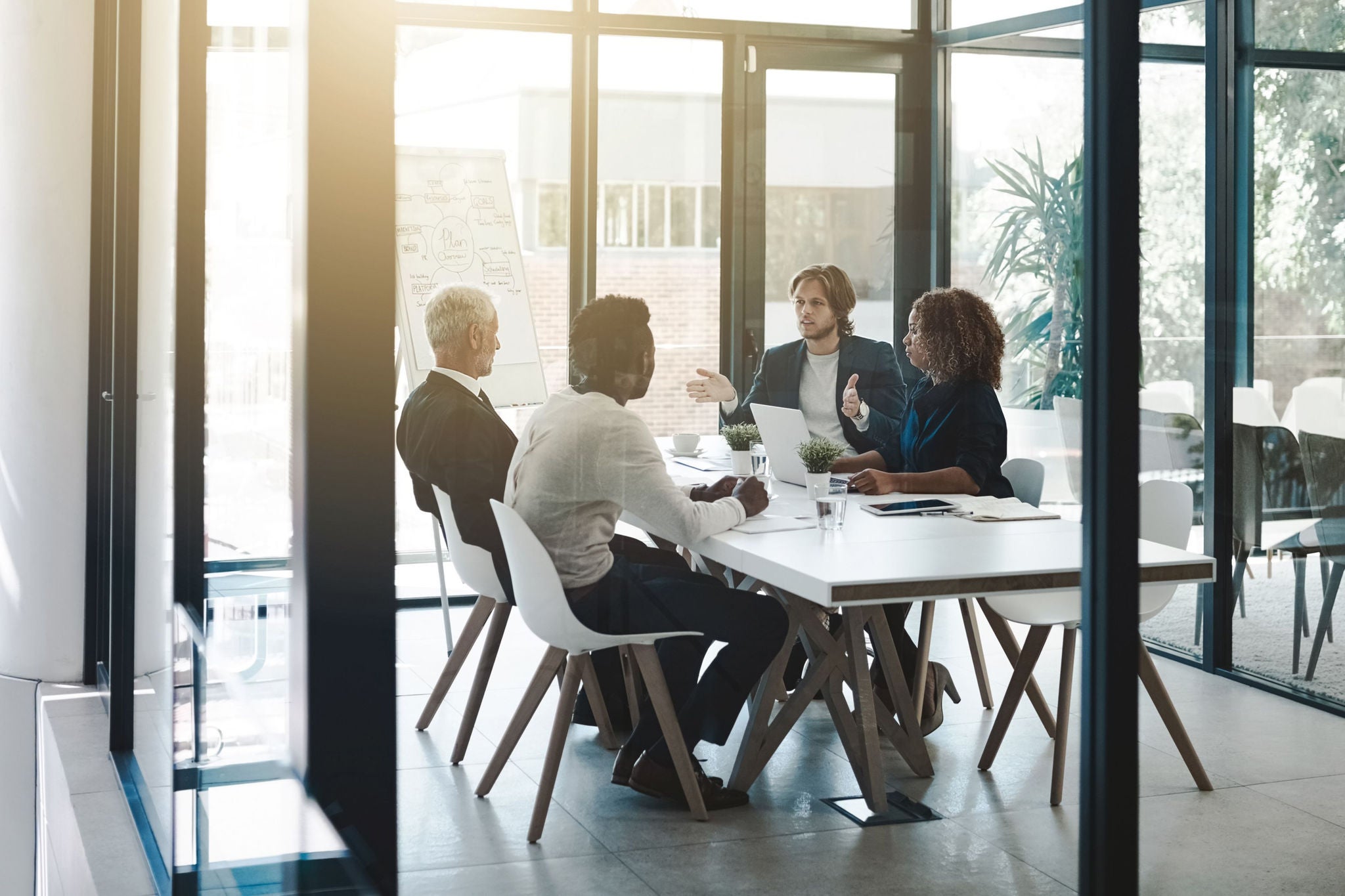 Group of businesspeople having a boardroom meeting in an office