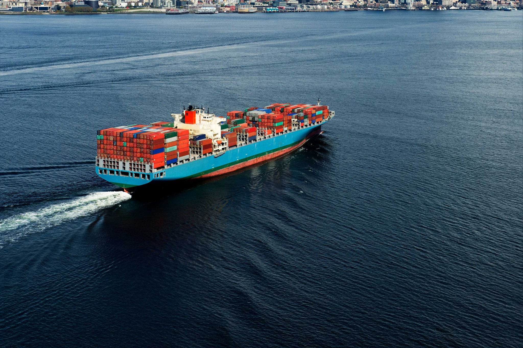 a cargo ship acrossing the sea