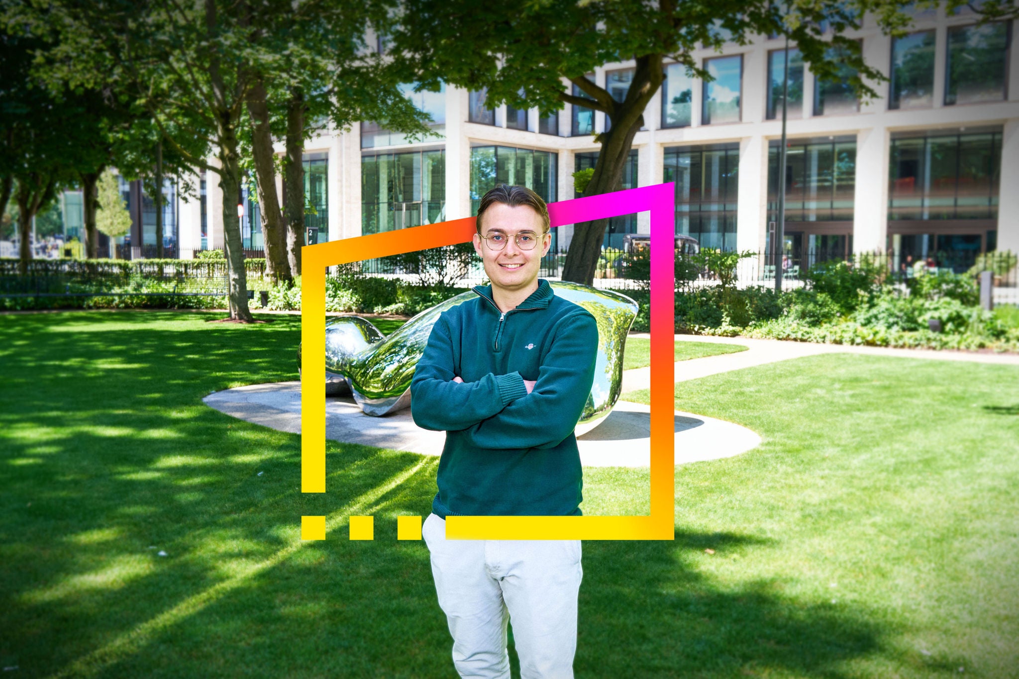 Eanna standing in a landscaped business park with EY brand frame graphic