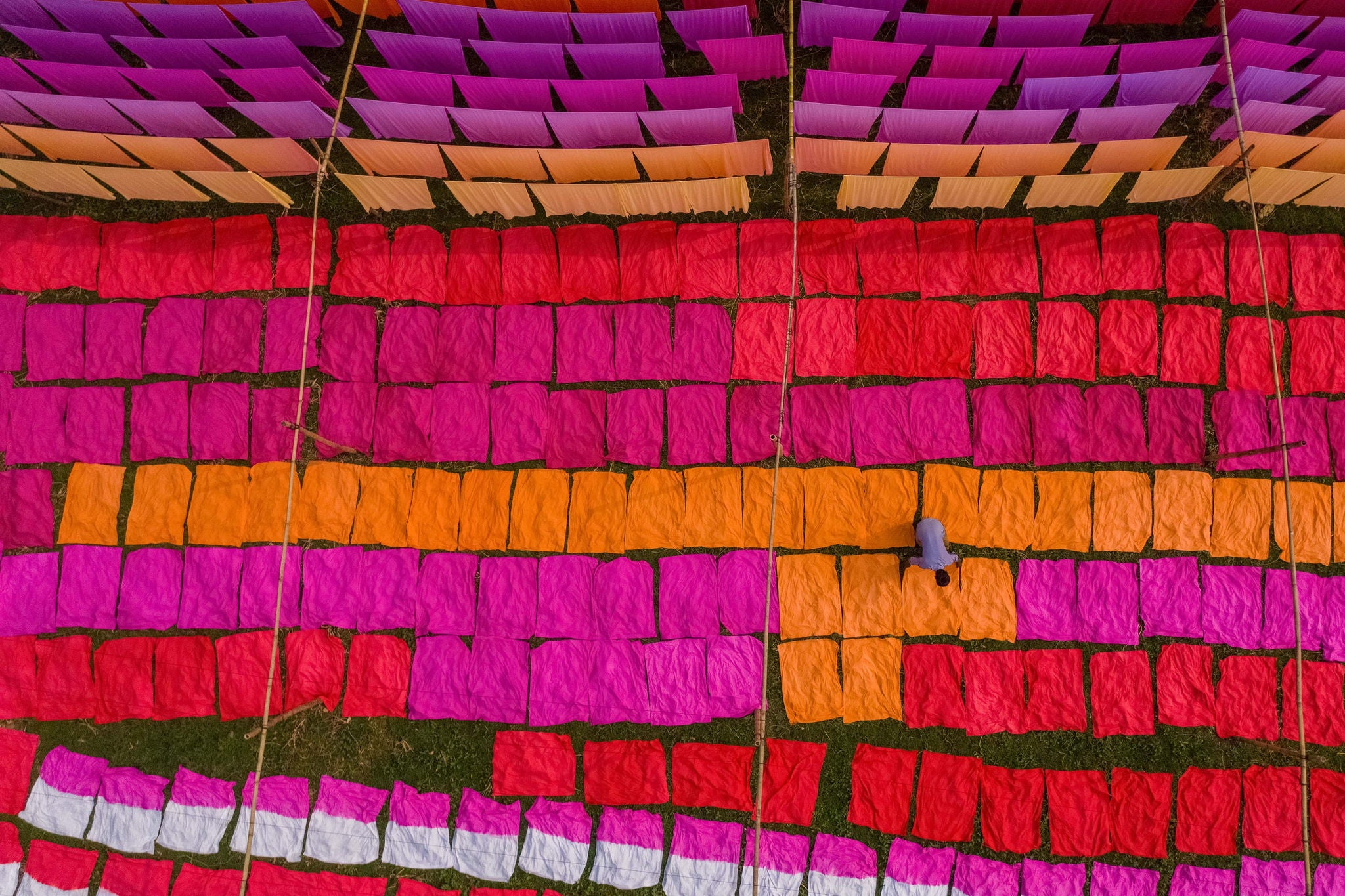 Ariel view of a man working in a public laundry