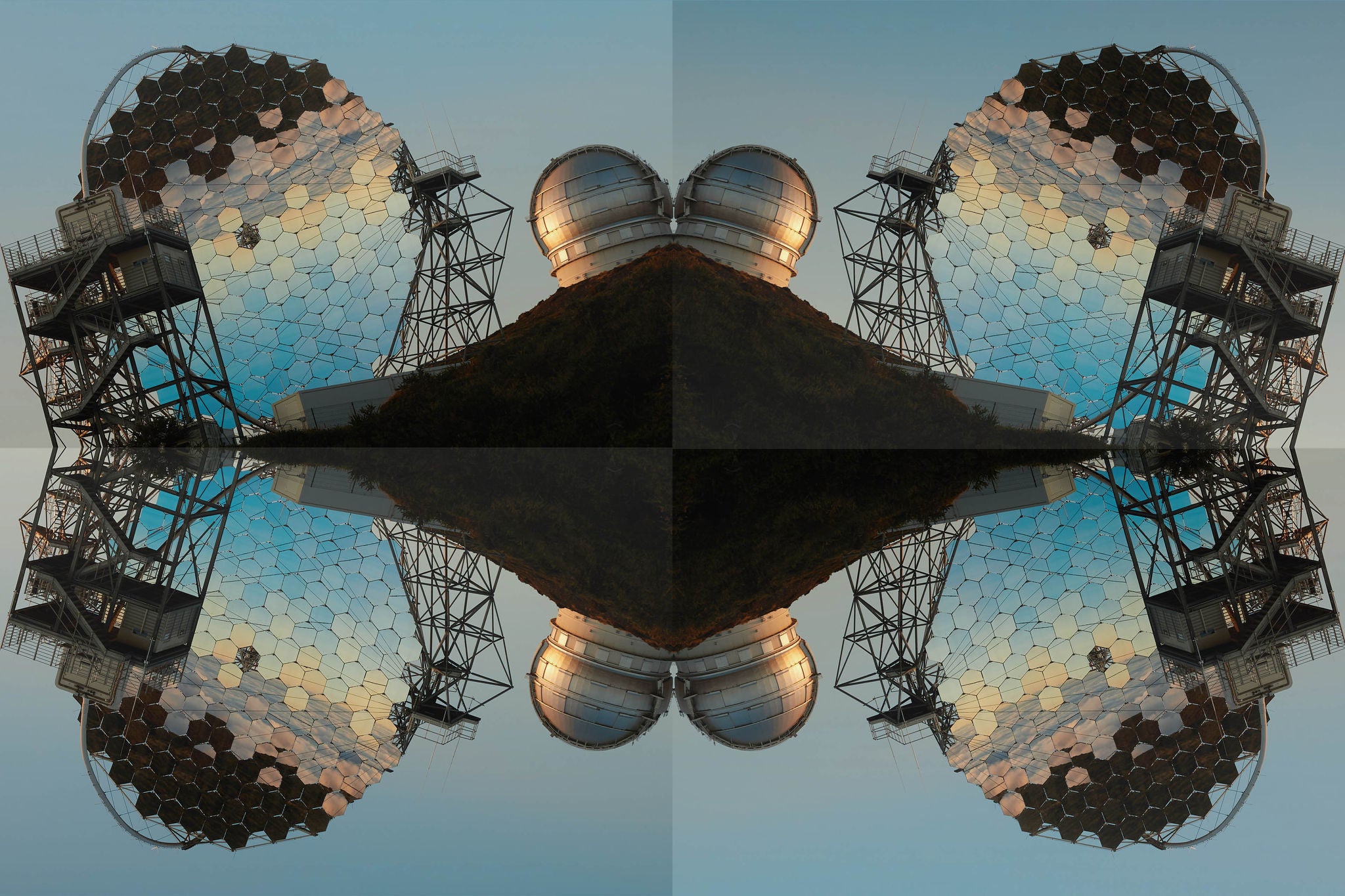 Various modern telescopes including MAGIC or Major Atmospheric Gamma Imaging Cherenkov Telescope located on hill slope at astronomical observatory on island of La Palma in Spain