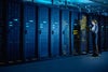Modern high-tech telecommunications operational data center in neon lights