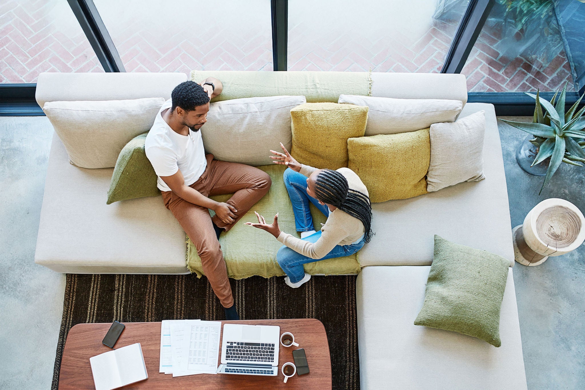 Shot of a young couple having a disagreement at home