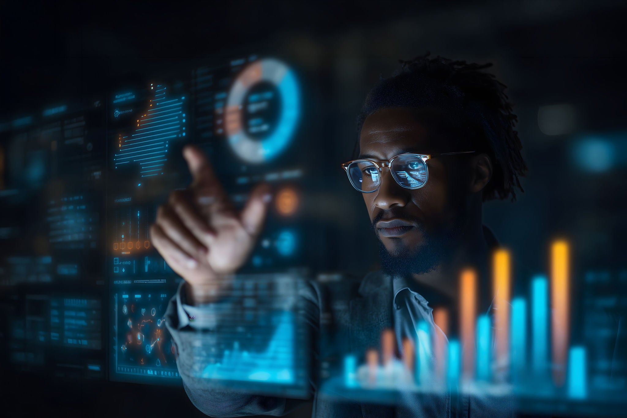 Person with glasses interacting with holographic data dashboards and charts in a dark, high-tech setting.