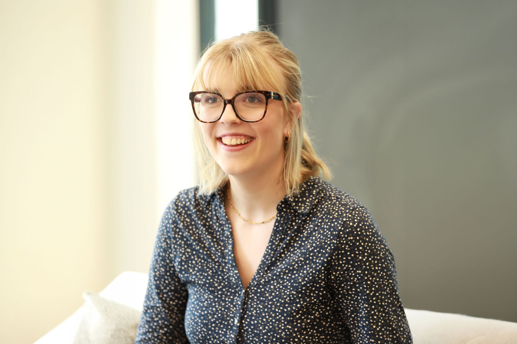 Person smiling to the camera