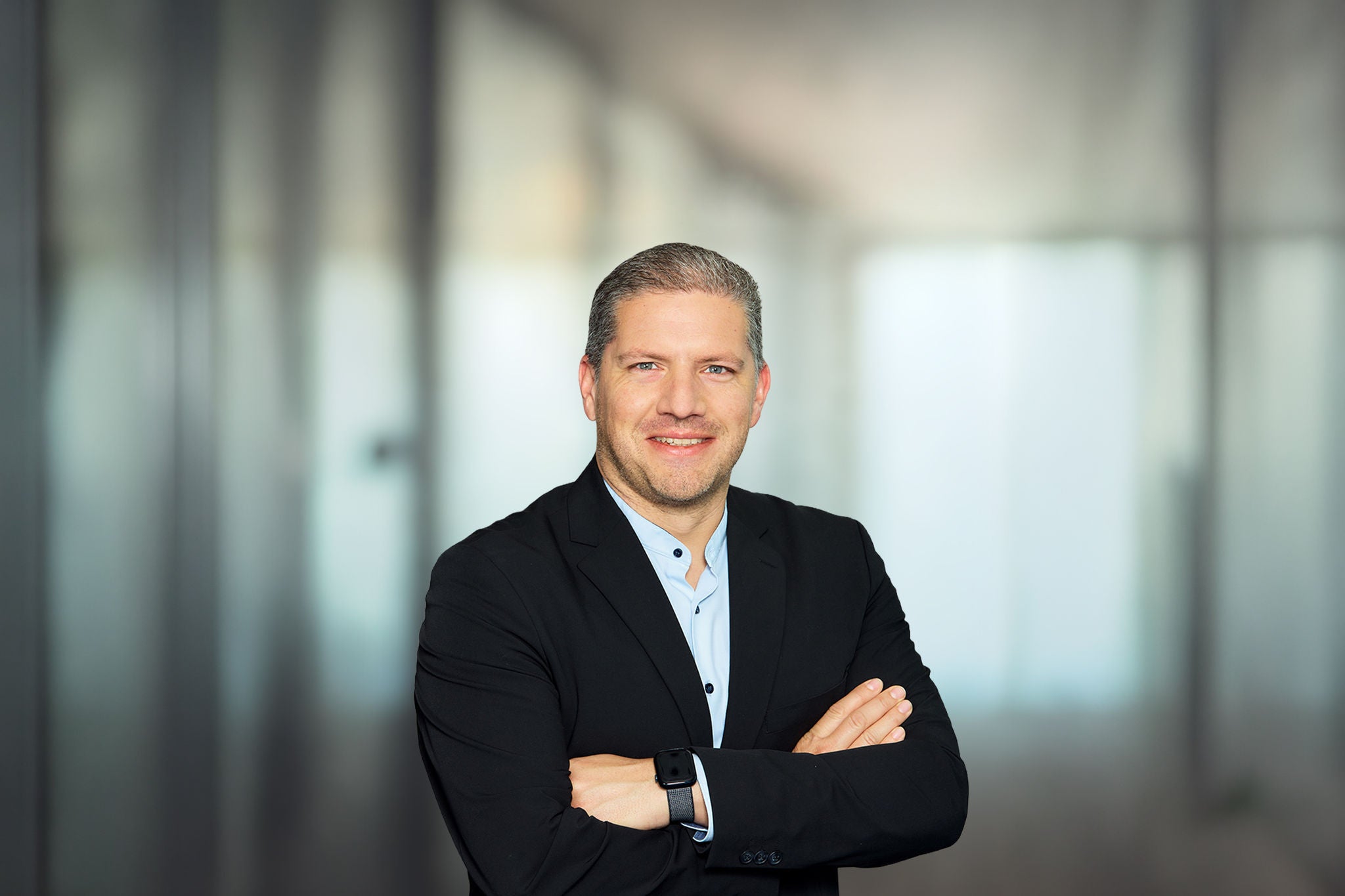 Porträtfoto von Christian Mayr, Head of Sovereign AI, EY