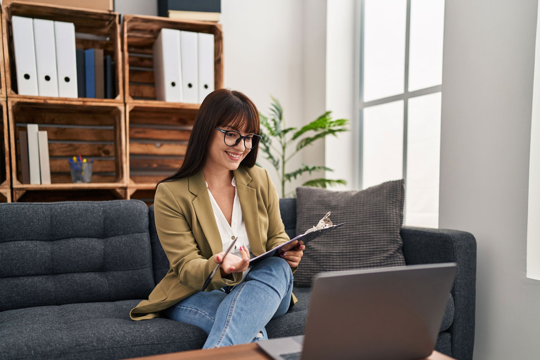 Young beautiful hispanic woman psychologist having online session at psychology clinic