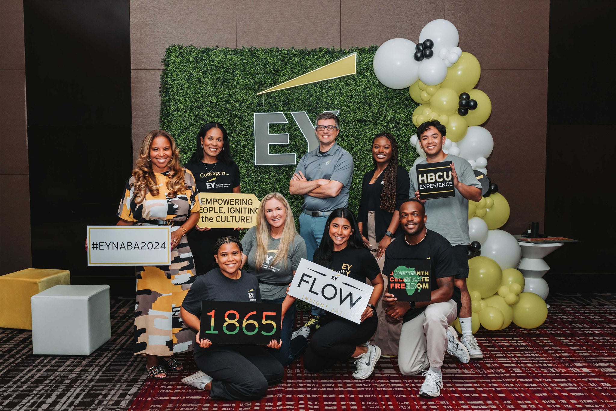 A view of daily work life at EY, employees collaborating, concentrating, and connecting in shared office spaces that support both individual focus and team interaction.