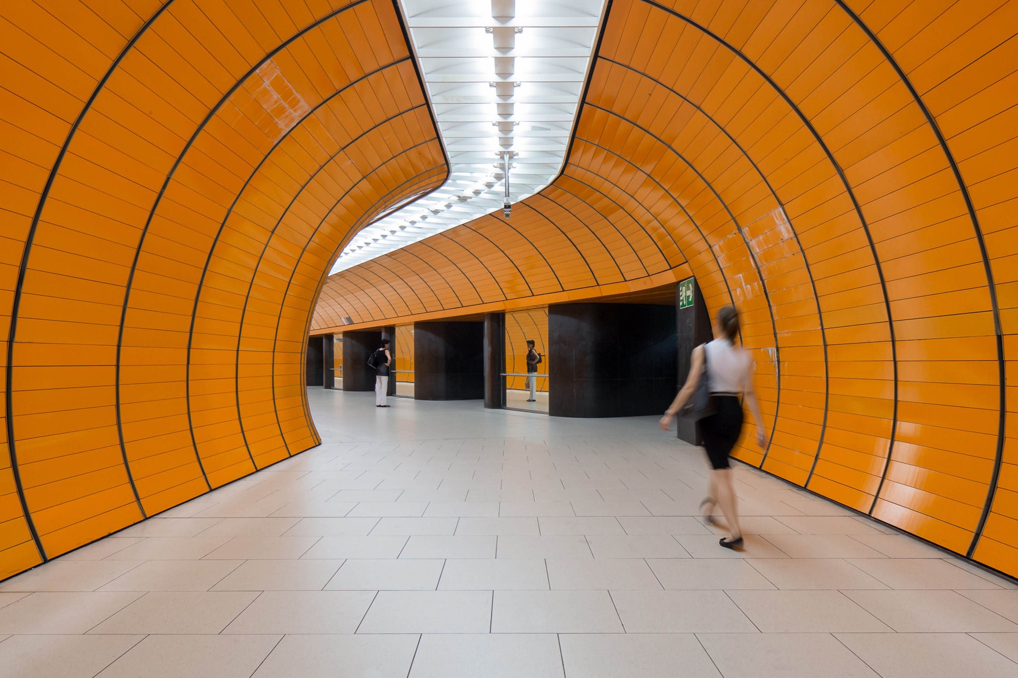 Woman walking in tunnel,Germany 