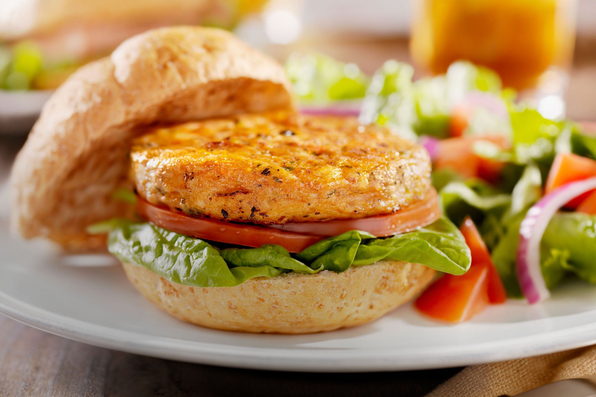 "Vegetarian Soy Burger with Spinach, Tomatoes and a Side Salad -Photographed on Hasselblad H3D-39mb Camera"