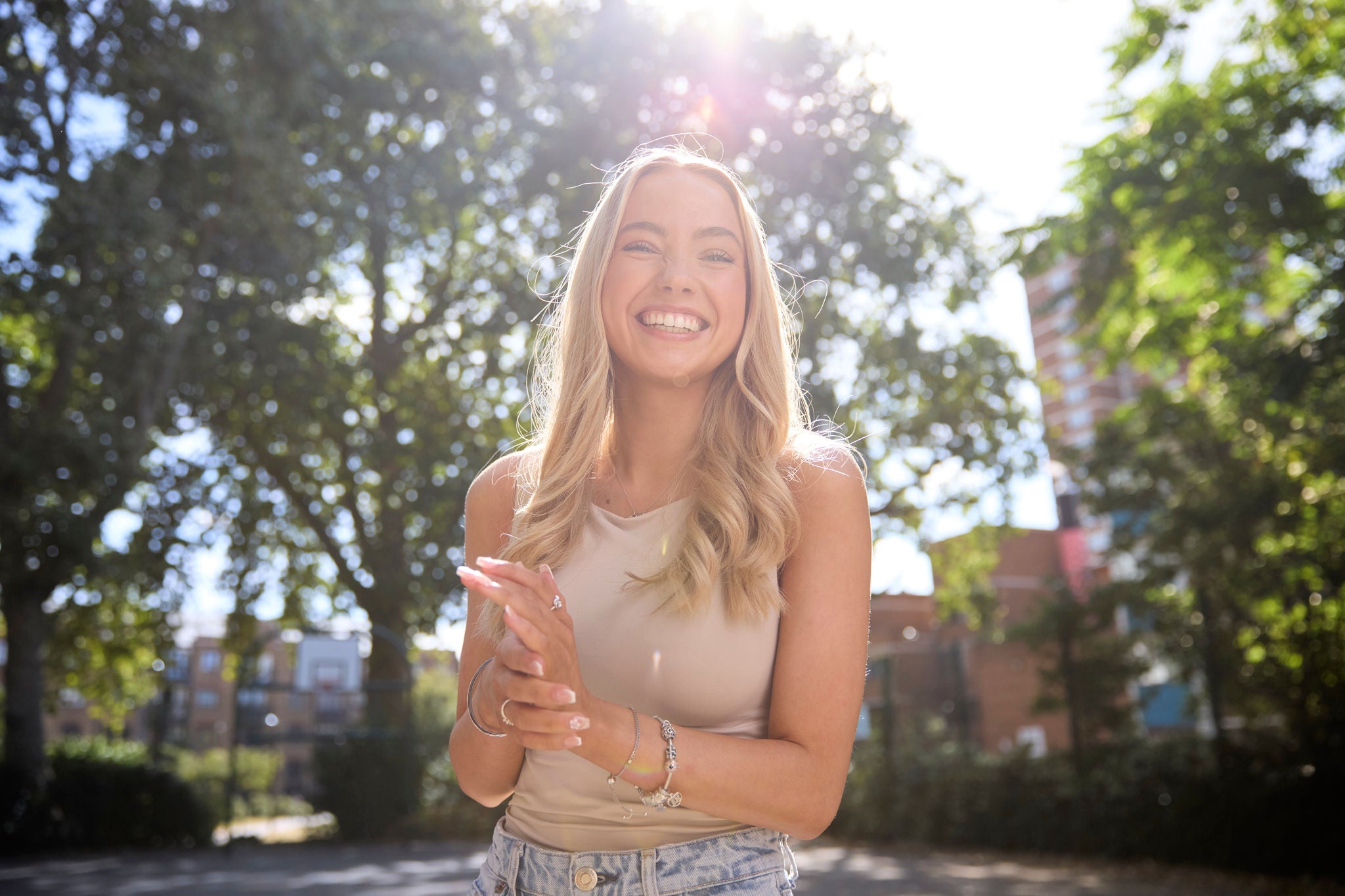 Person in a sunny park setting
