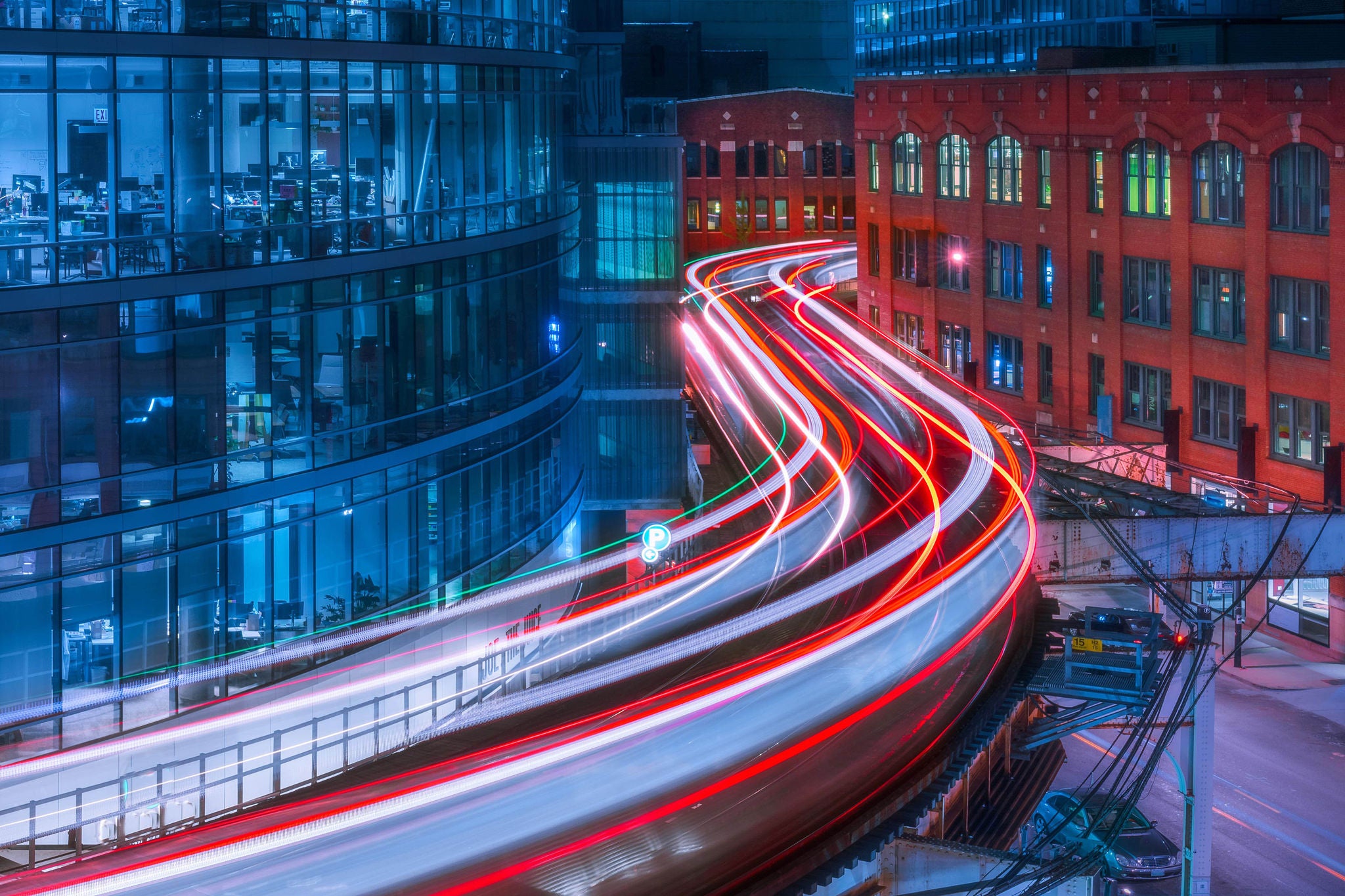 Man working on laptop while sitting in kitchen at home