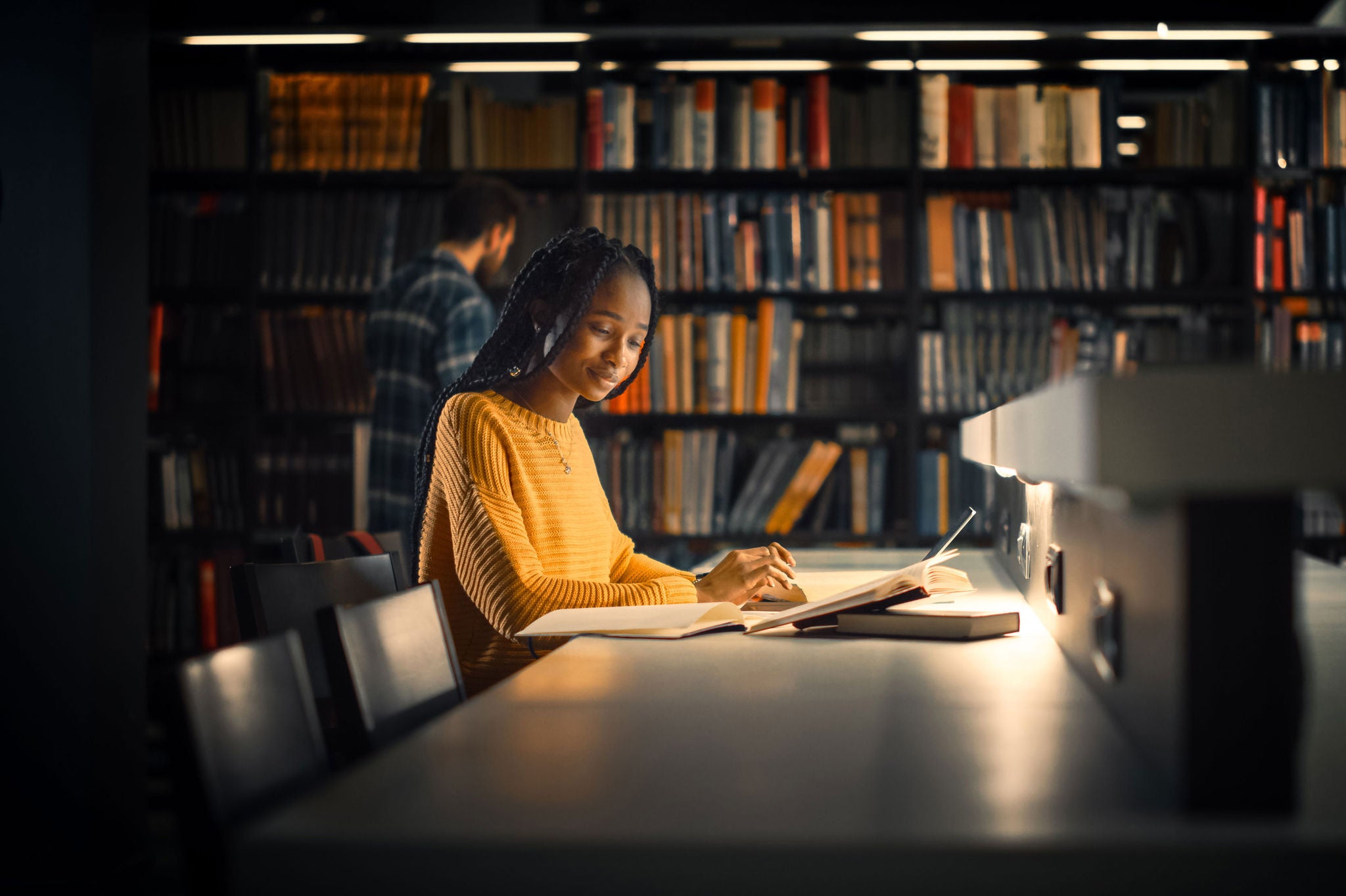 Girl studies in university library