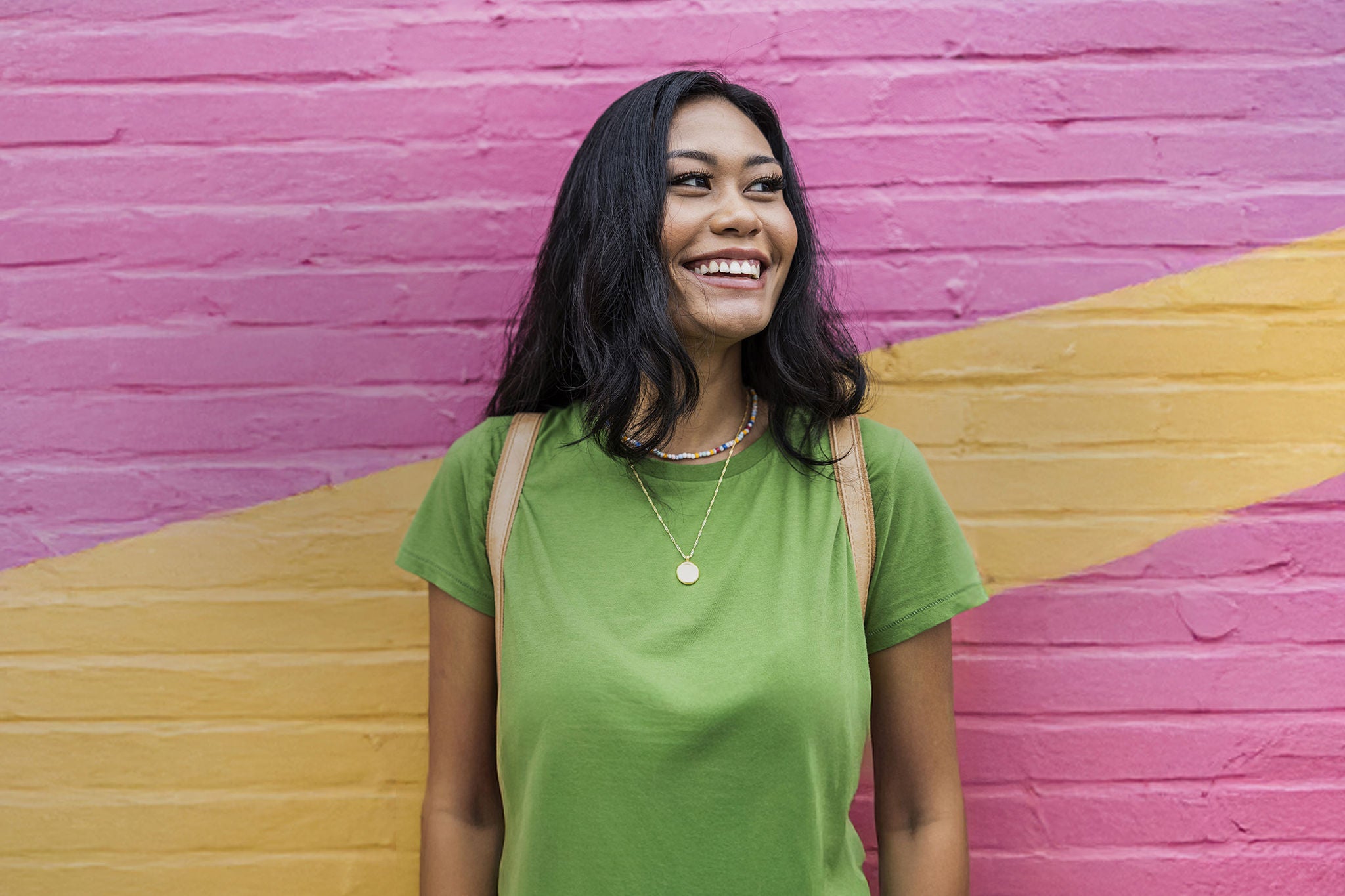 A woman with lights behind