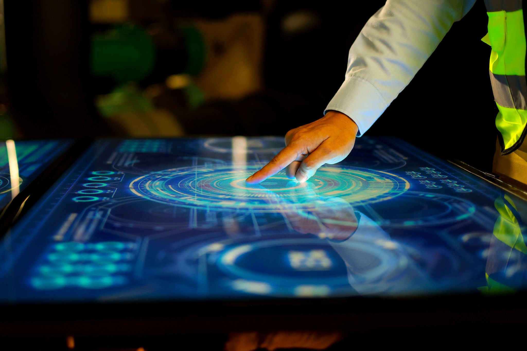 Man controling using the table touch screen tablet
