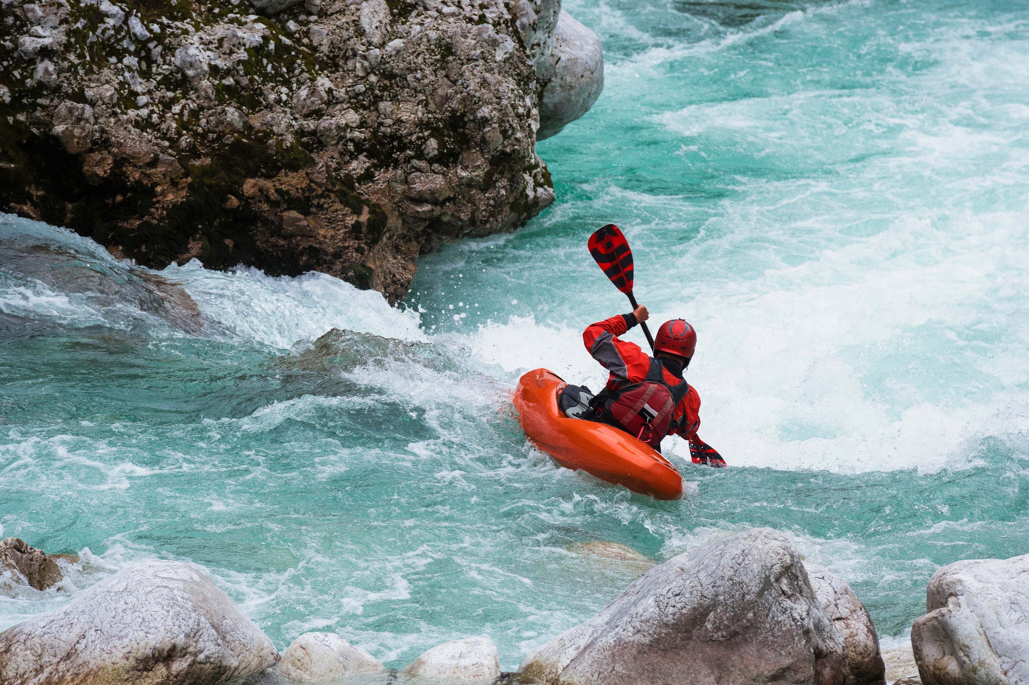 Kayaking on Soca river, in the most dangerous section at Tolmun Otana, Triglav National Park, Slovenia