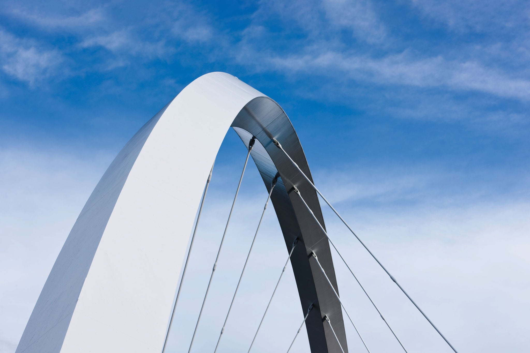 Abstract view of the arch of the Finnieston Bridge in Glasgow, Scotland.The Finnieston Bridge crosses over the River Clyde in Glasgow - also known as the Clyde Arc and, less formally, the "Squinty Bridge".