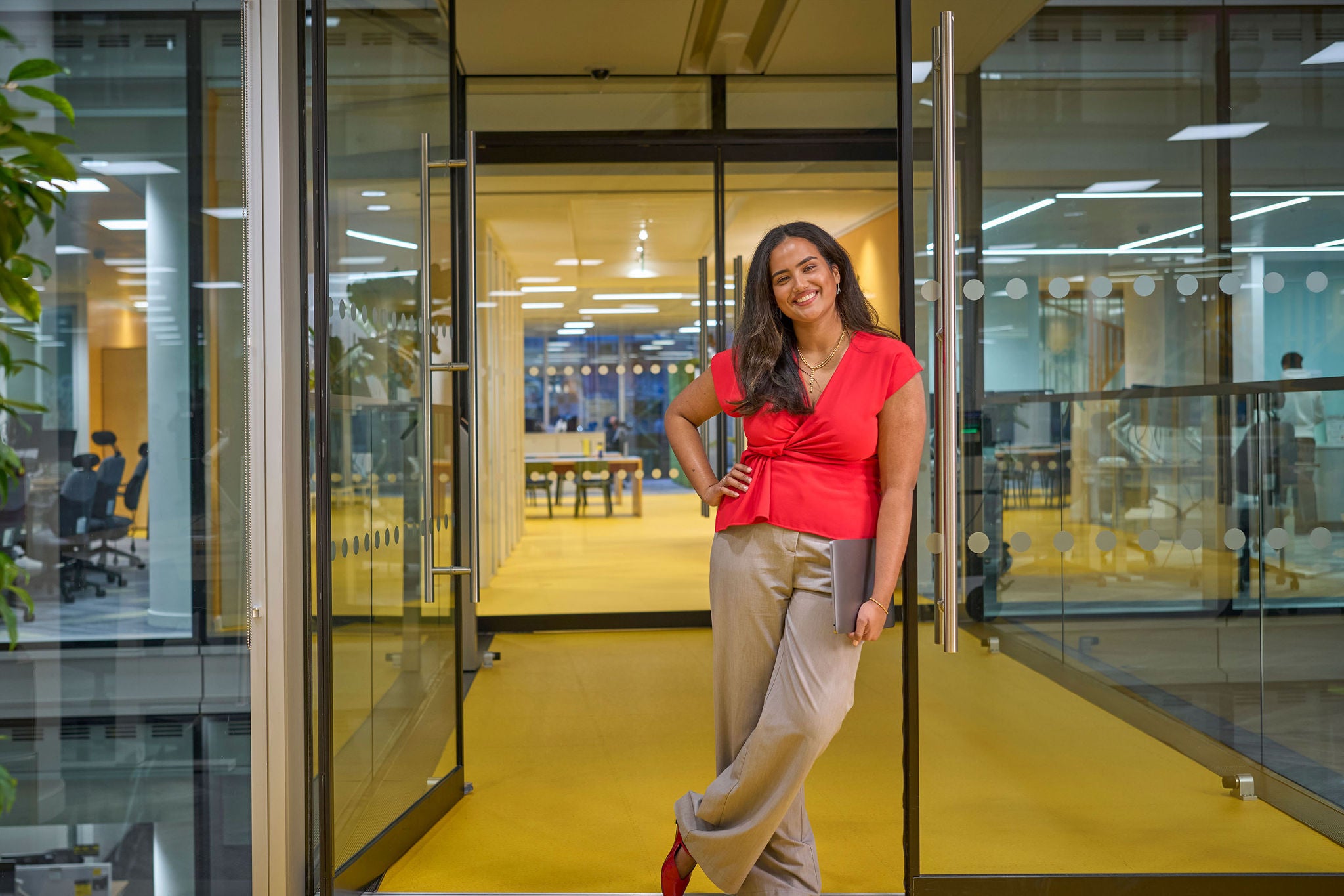 Person standing in the doorway of the office