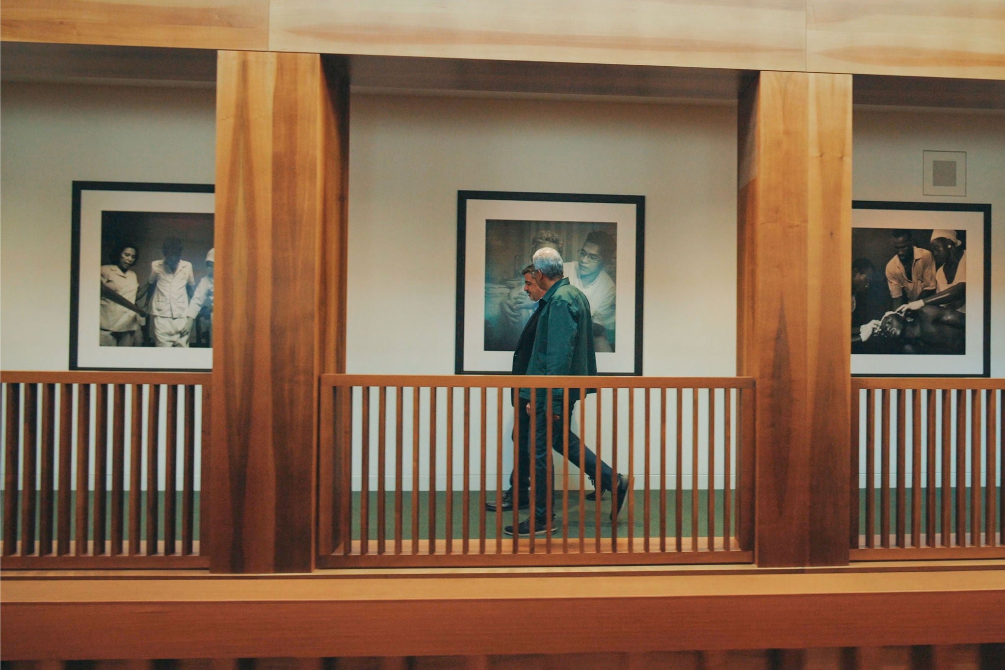Two men walk down the corridor at the Novartis office