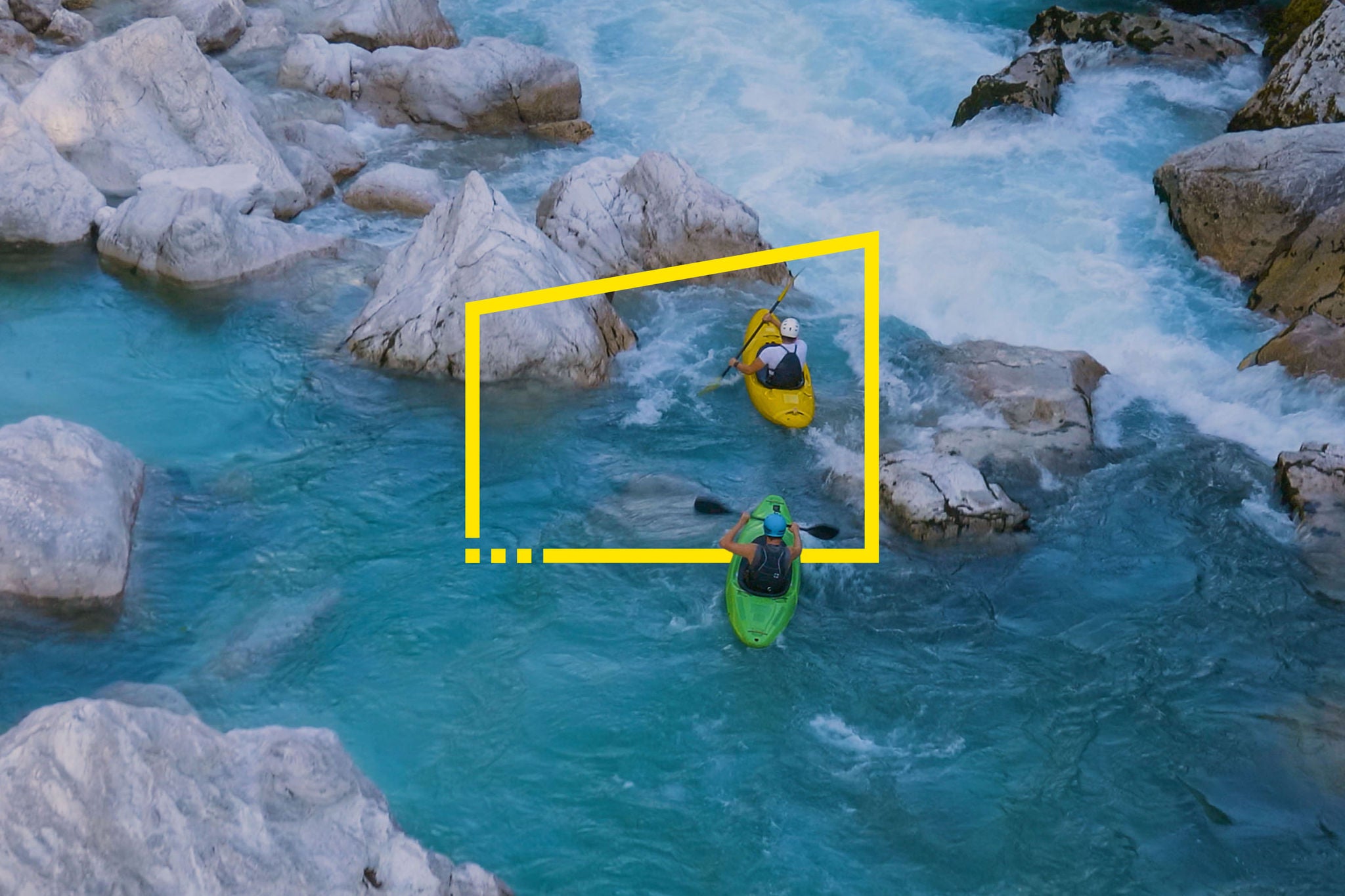 Two men kayaking through a river