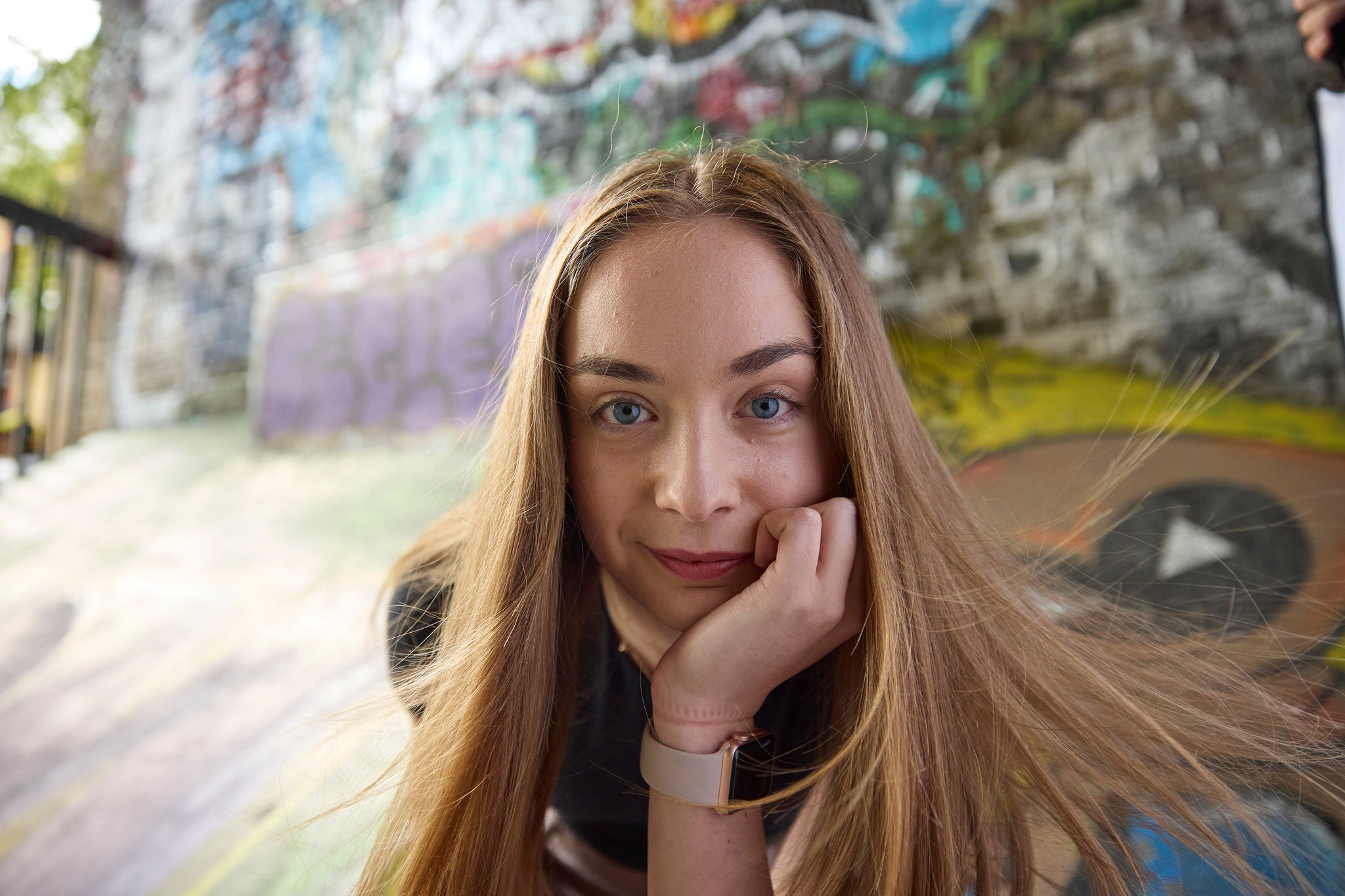 Person sitting in a skate park