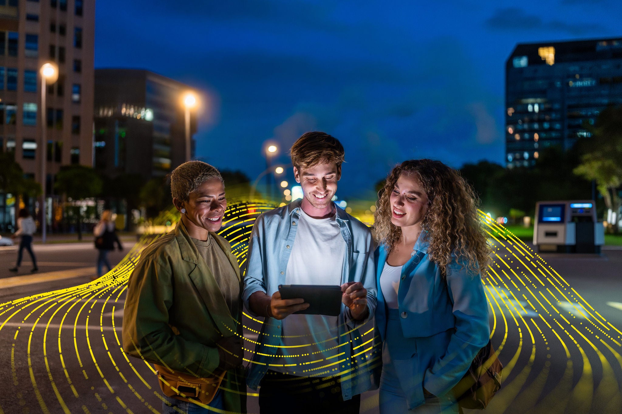 People using a tablet in a smart city