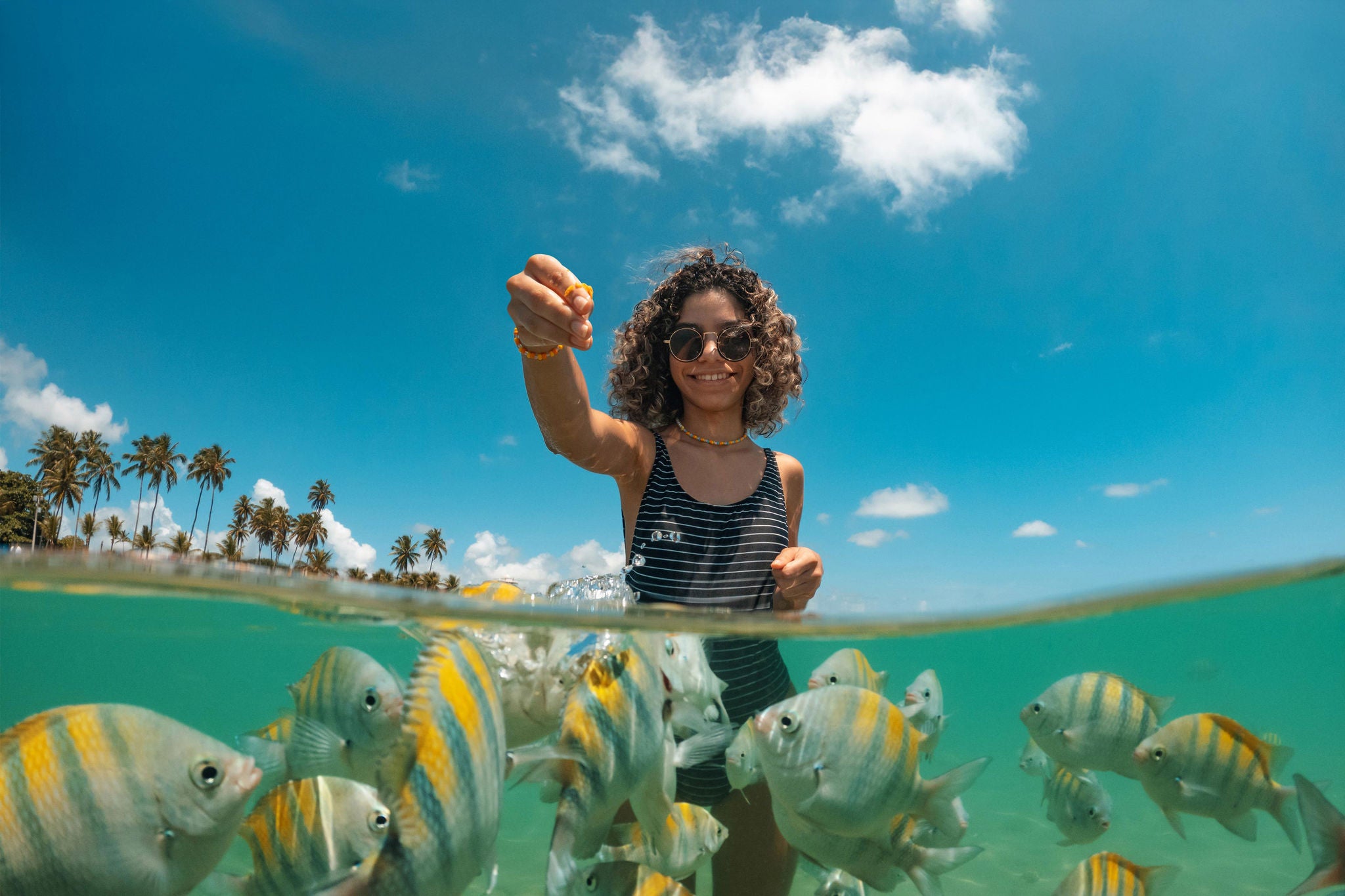 Brazilian tourism at Porto de Galinhas beach in Pernambuco