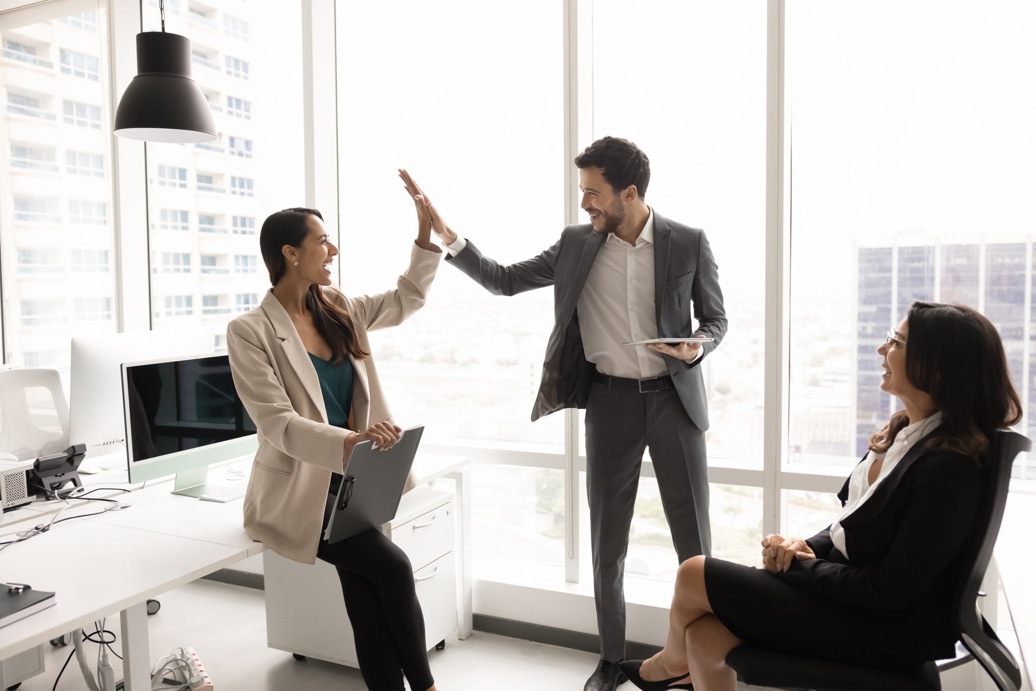 Two happy diverse teammates