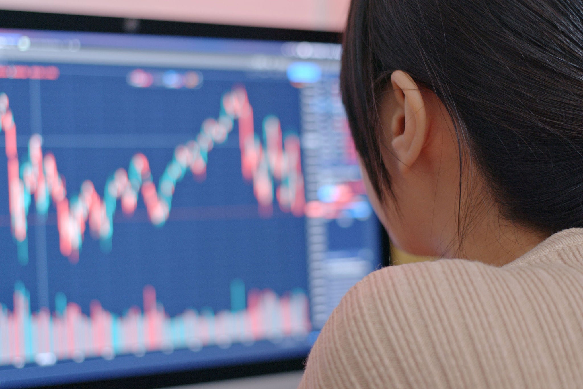 Woman study the stock market data