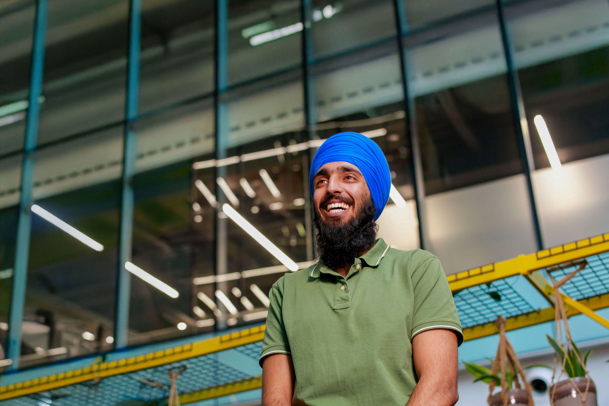Person standing in the office smiling