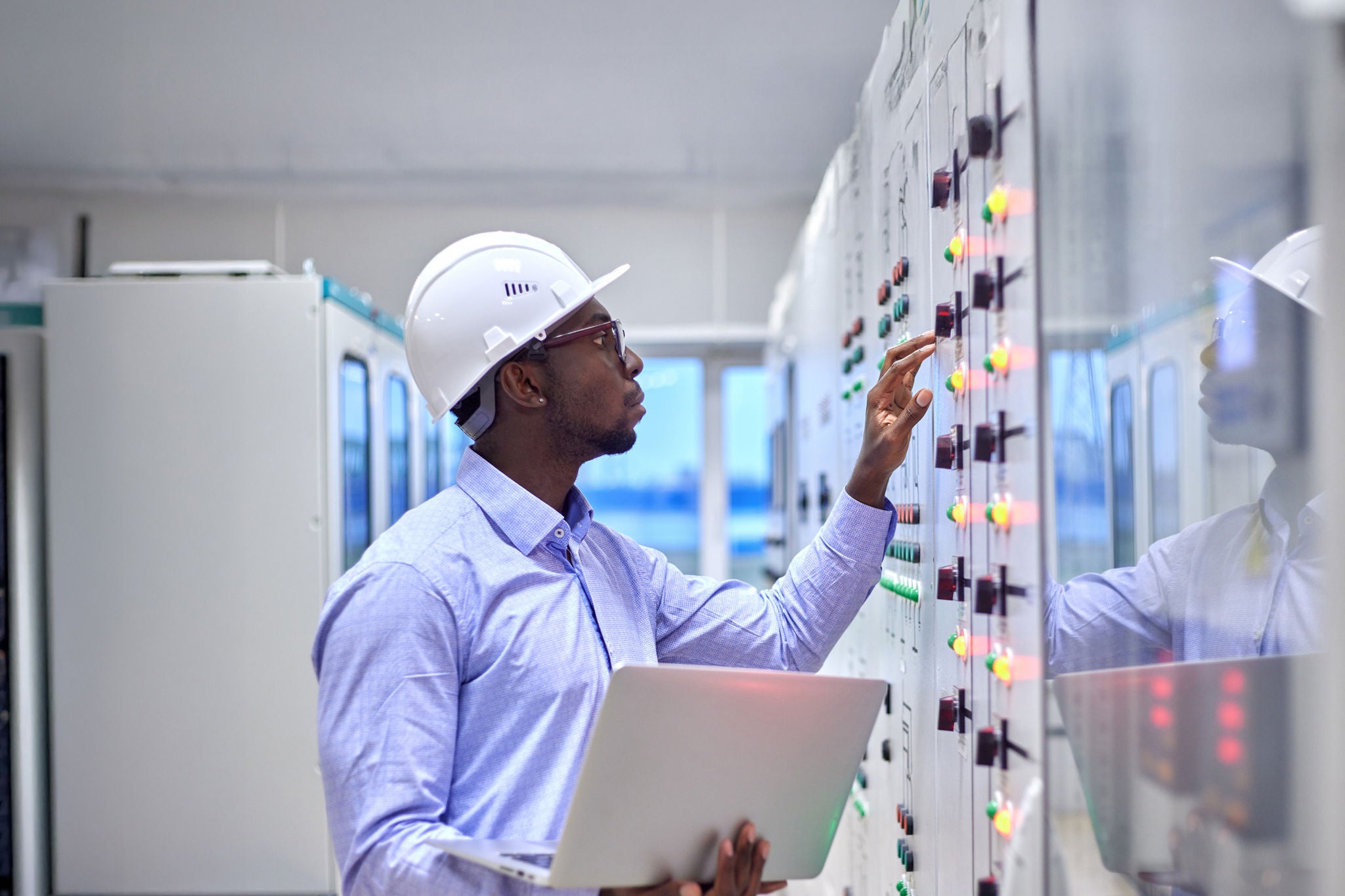 Engineer man laptop control room