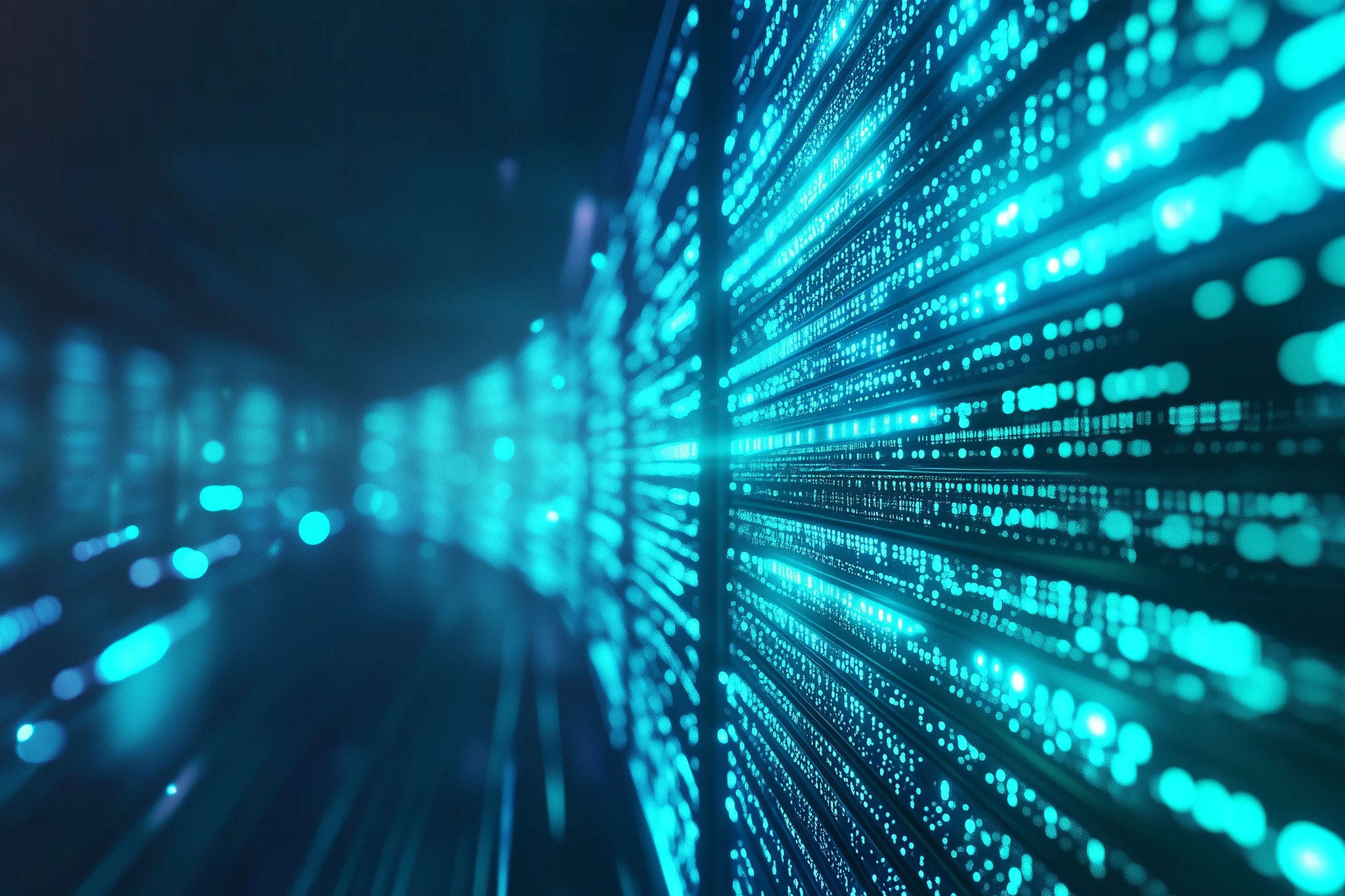 A modern data center with rows of servers emitting a digital glow in blue and green.