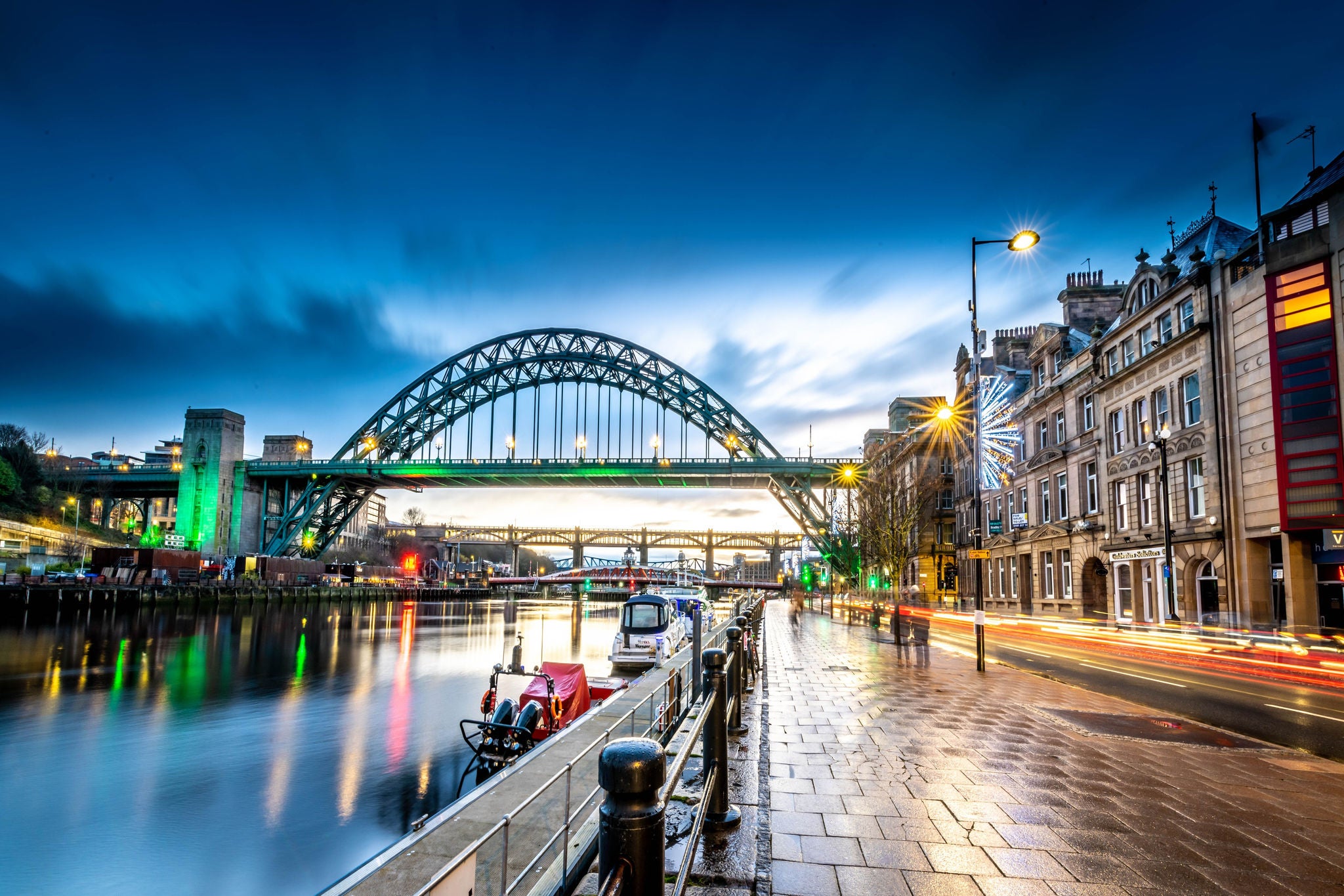Tyne Bridge and riverside walkway at dusk