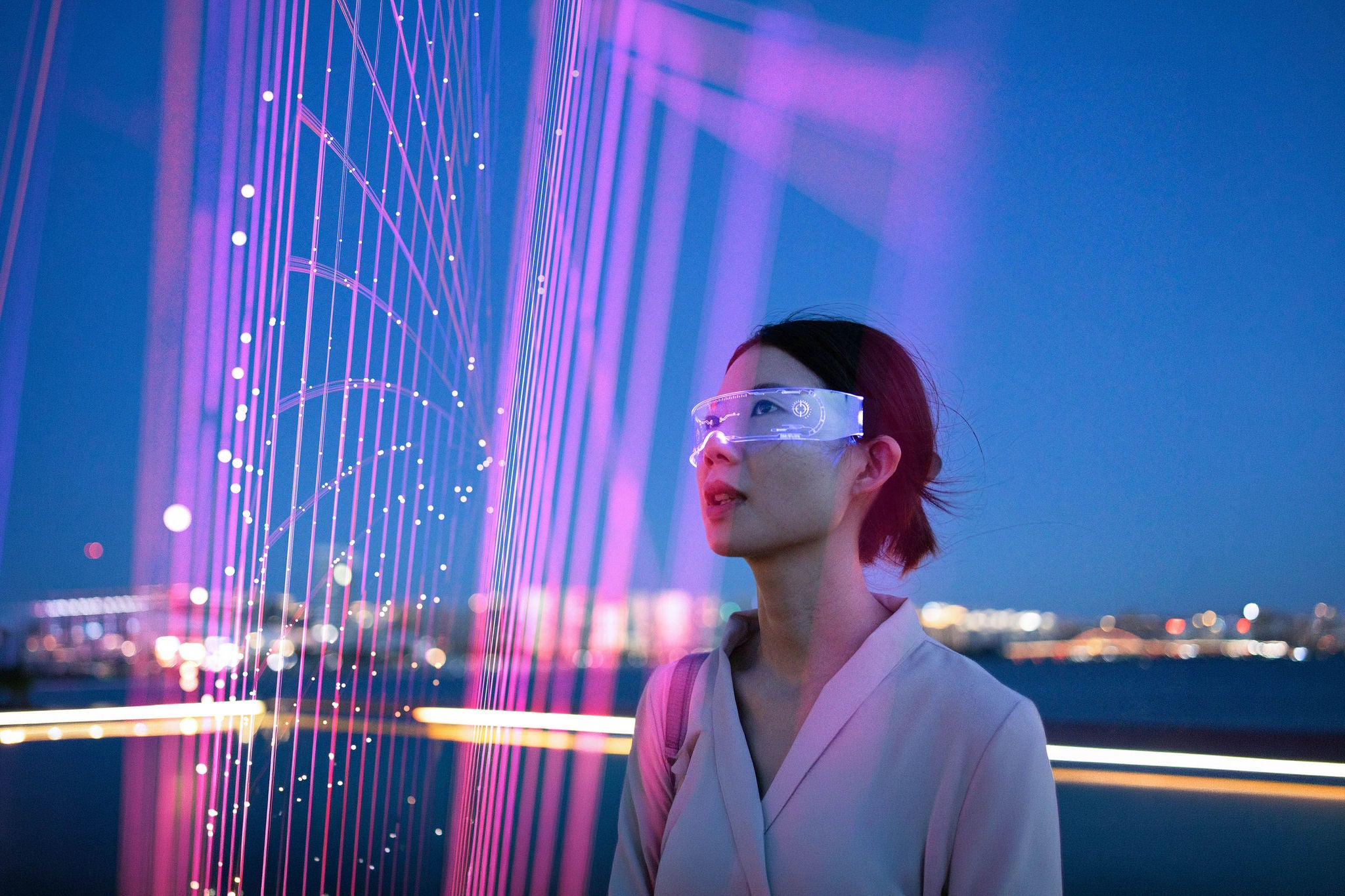 Asian woman using artificial intelligence glasses