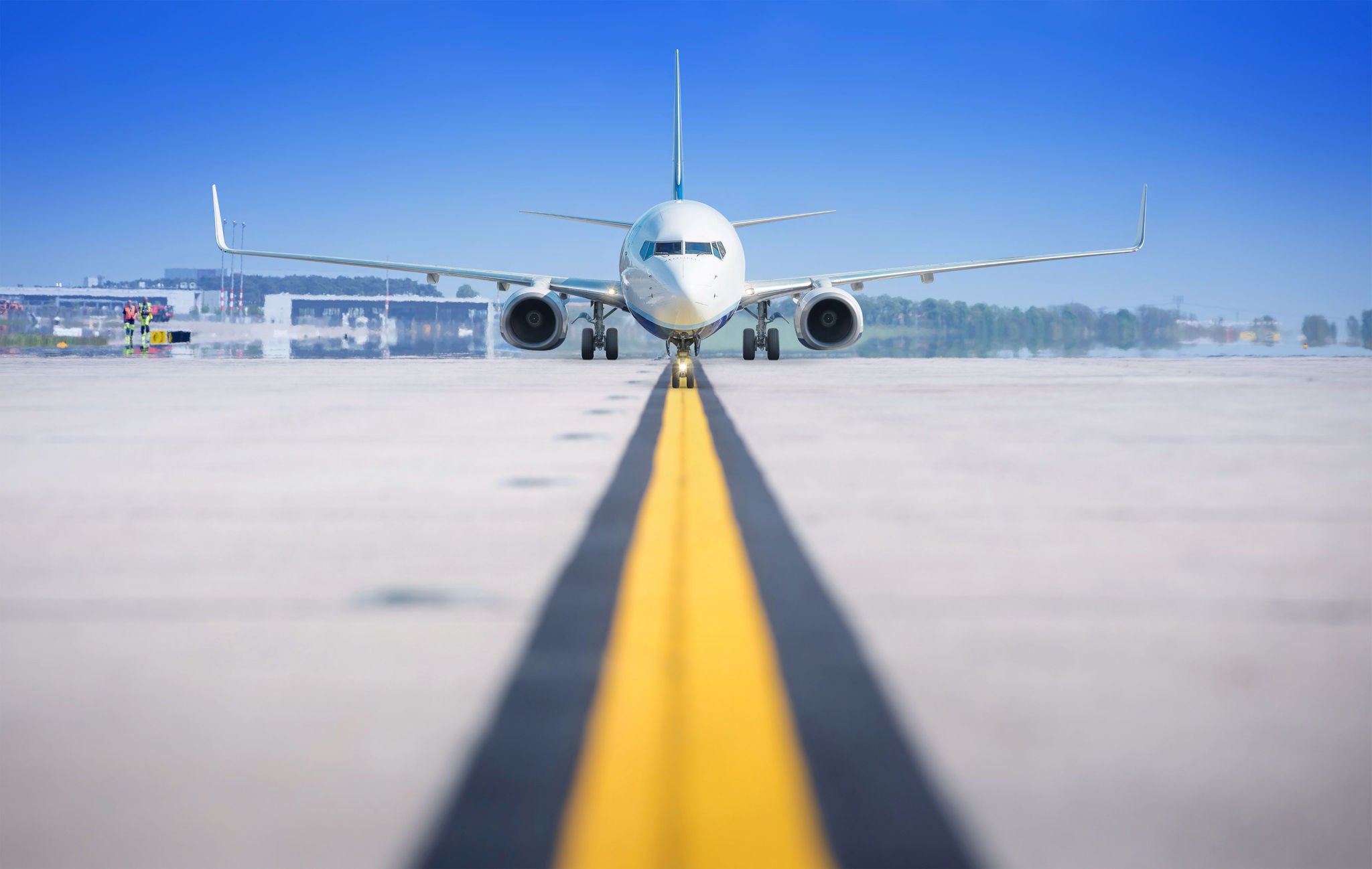 Modern airliner on a runway.