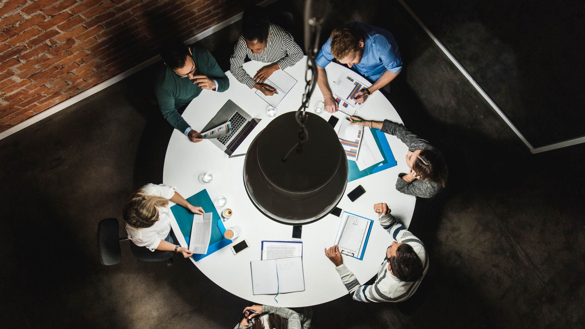 people sitting around a round table