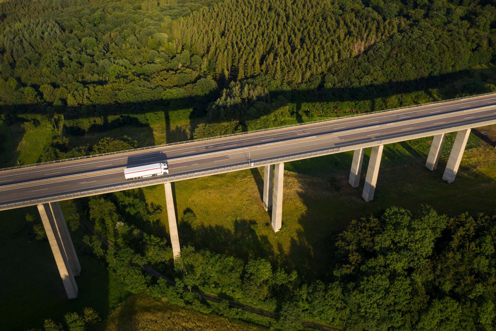 Truck driving on autobahn bridge 