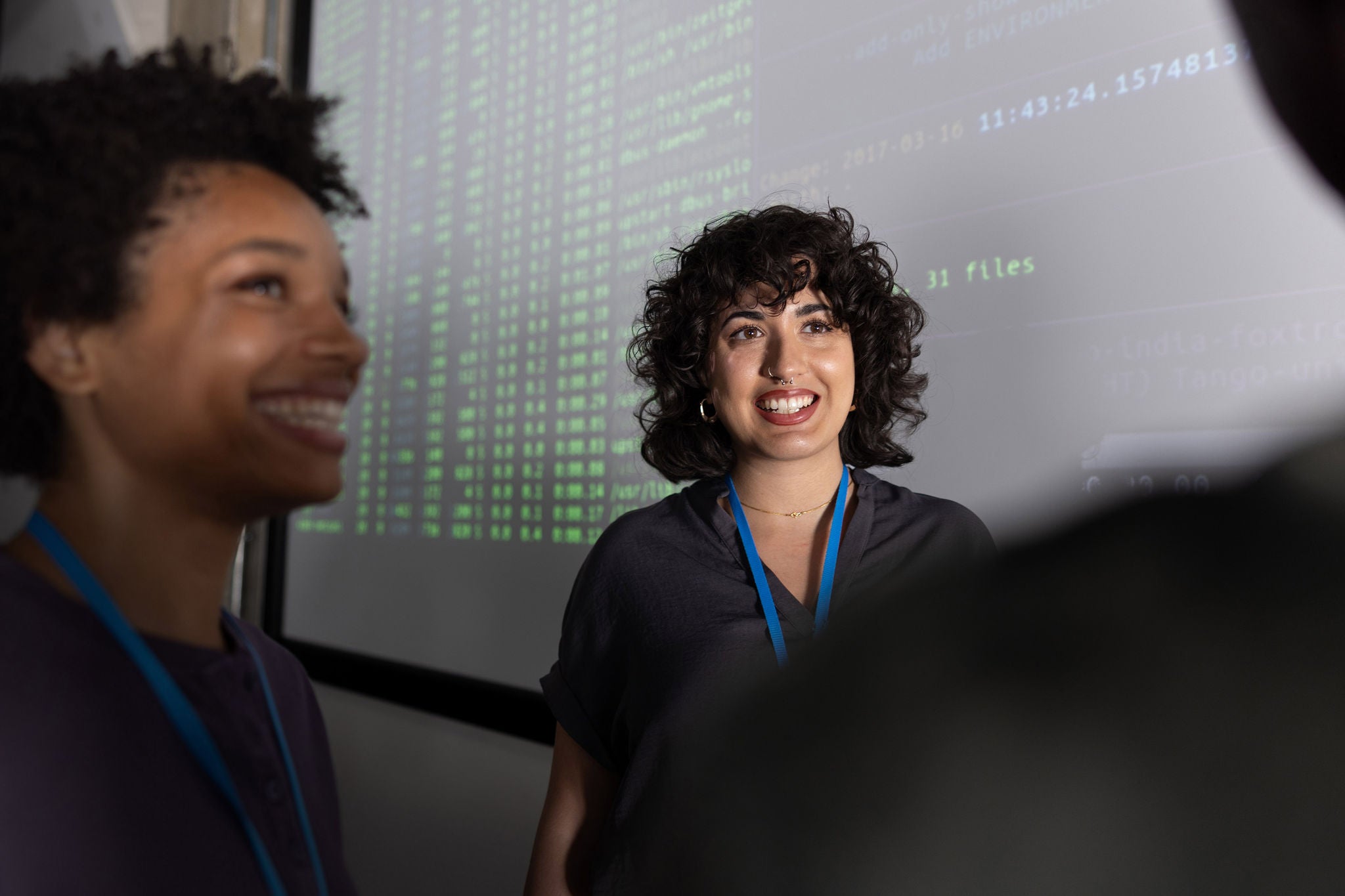 Group of coders meeting at a tech conference.