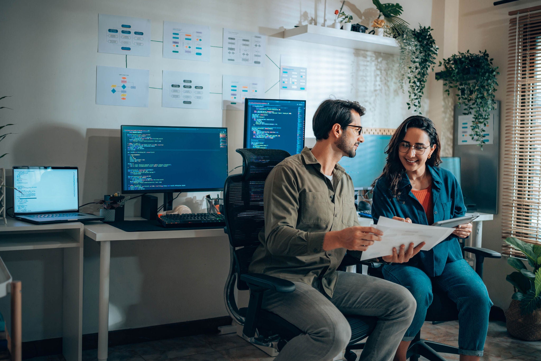 Software engineer and web developer collaborating