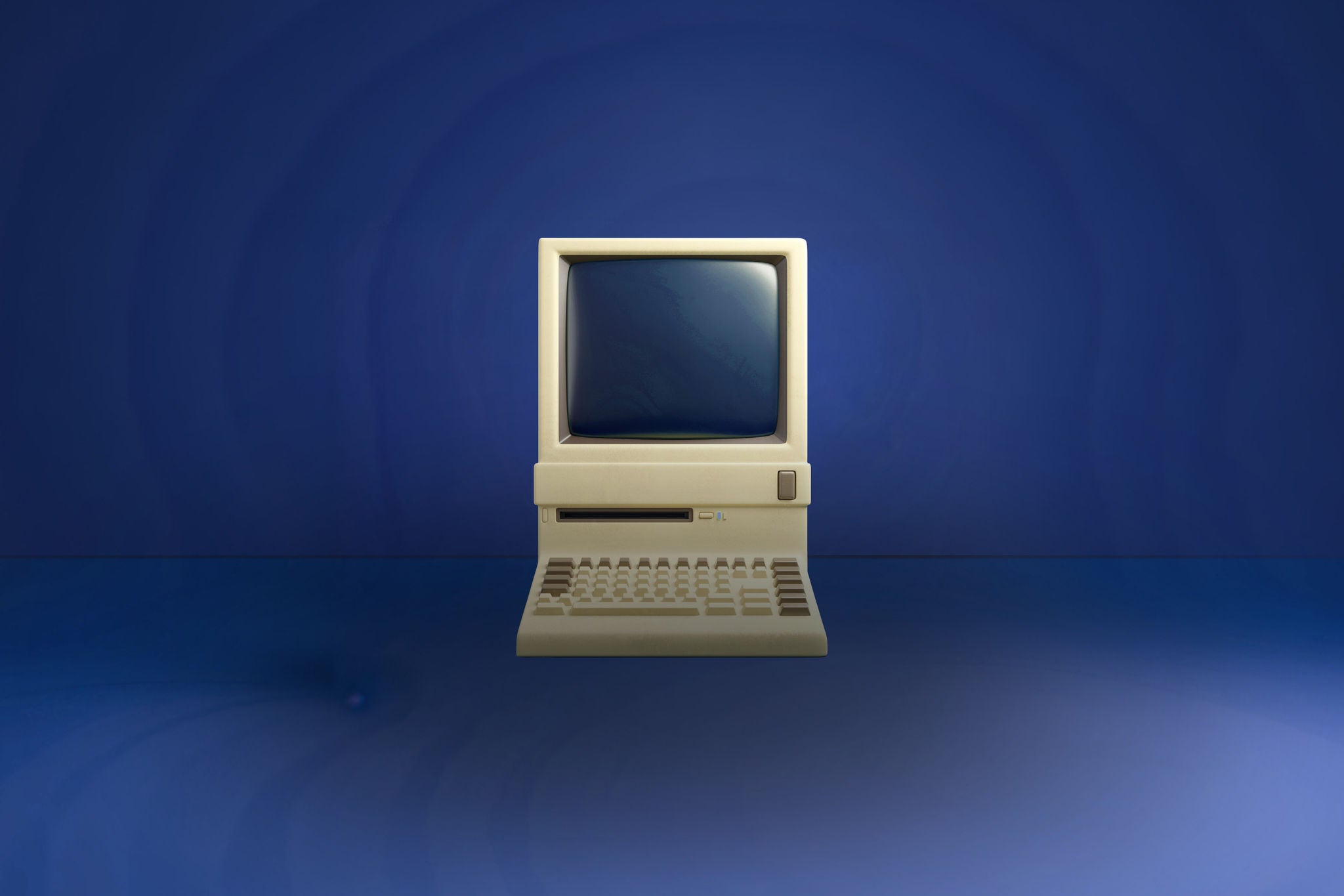 Old computer on a blue background