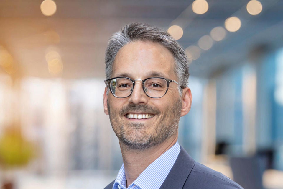 Portraitfoto von David Koch