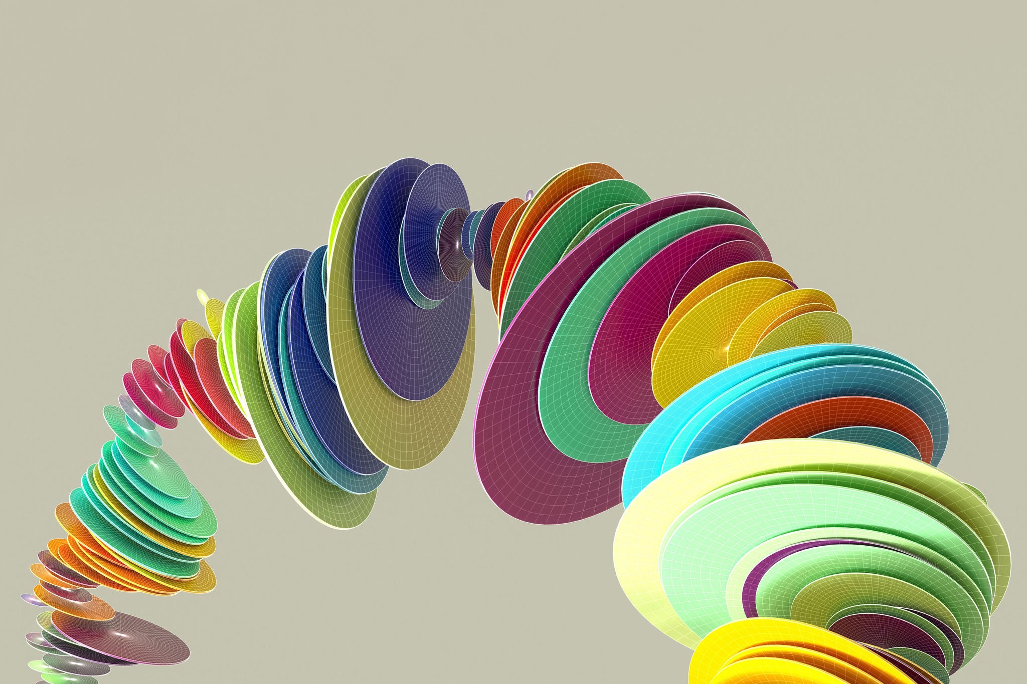 Digital generated image of multi colored discs organised into circular pattern.